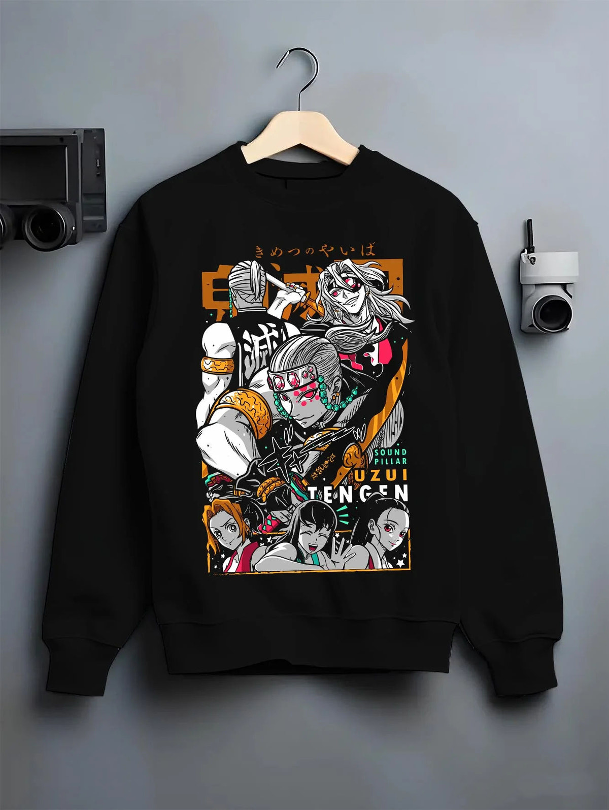 Black crewneck sweatshirt on hanger featuring Tengen Uzui Sound Hashira battle Demon Slayer artwork.