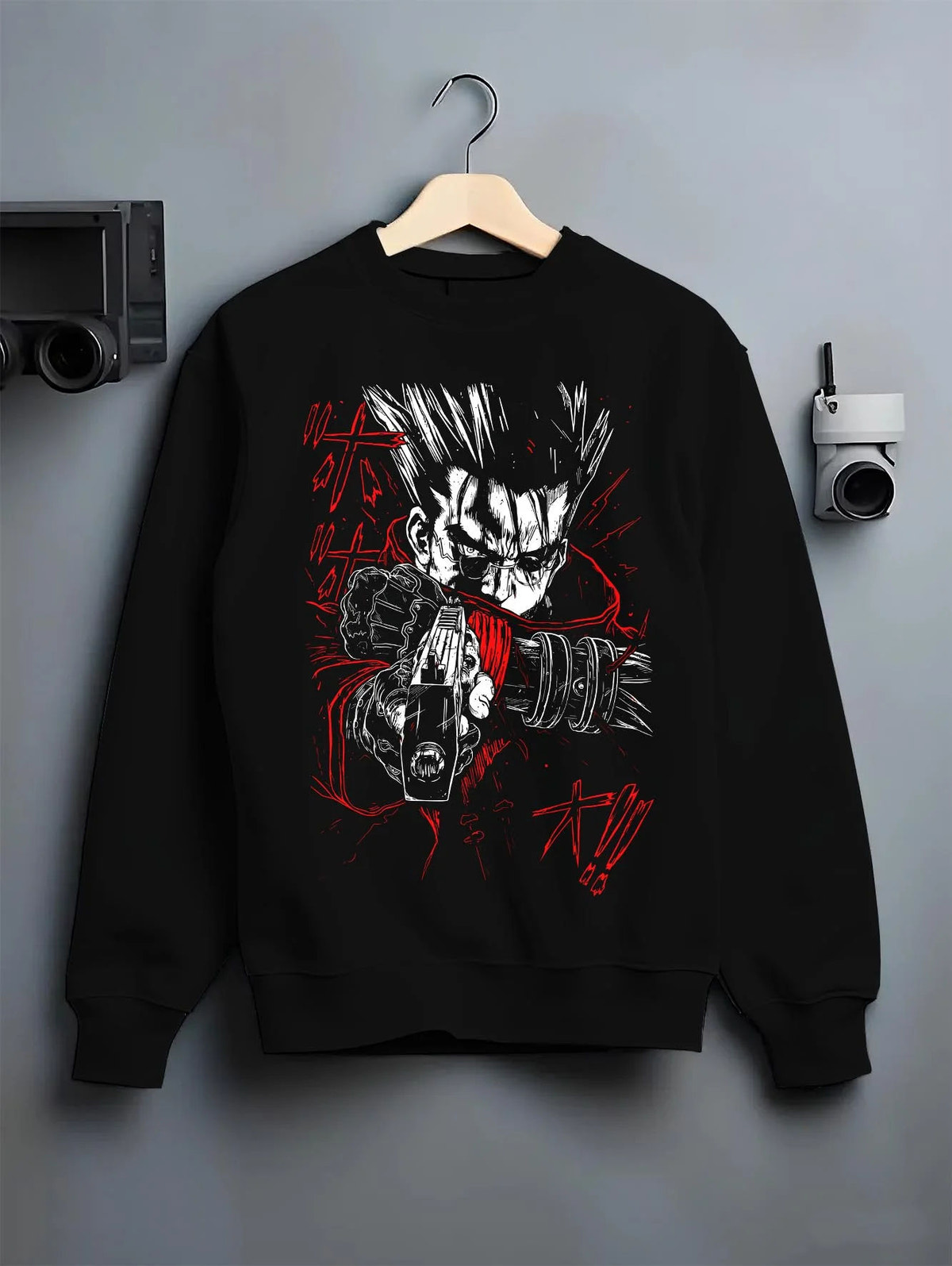 Black crewneck sweatshirt on hanger featuring Vash the Stampede Humanoid Typhoon Trigun artwork.