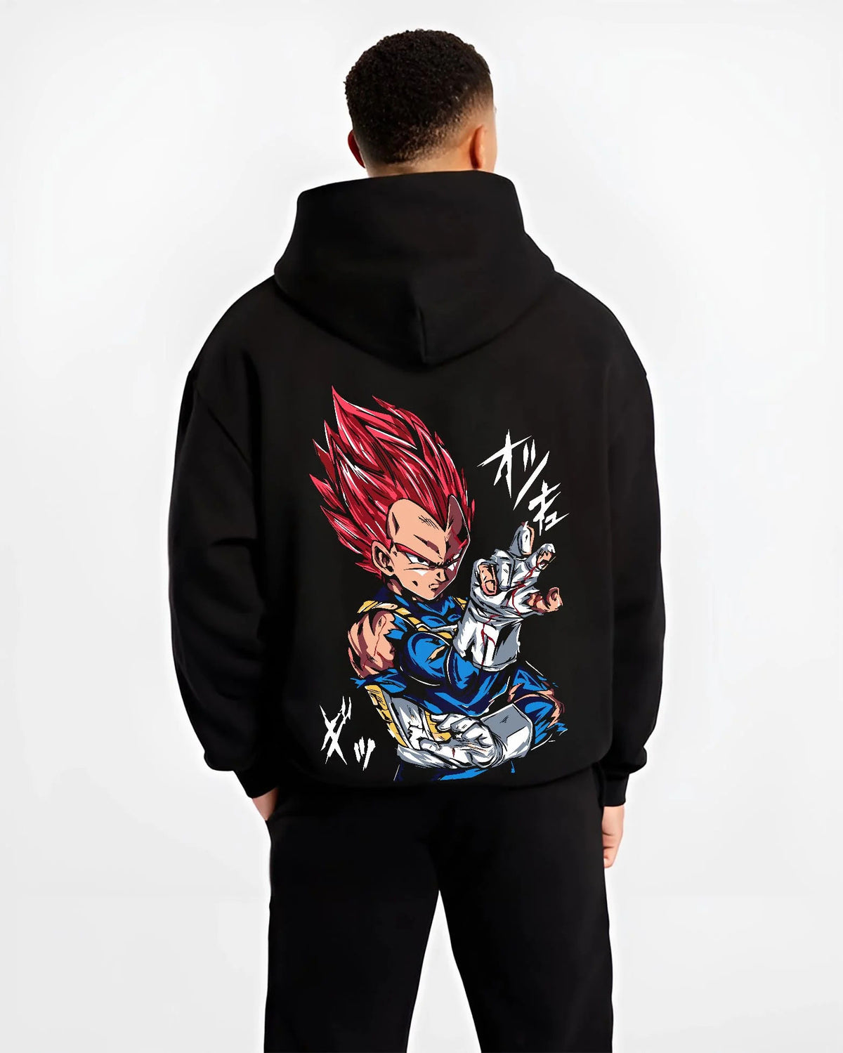 Black hoodie worn by male model from the back featuring Vegeta Super Saiyan God red aura Dragon Ball Super artwork.