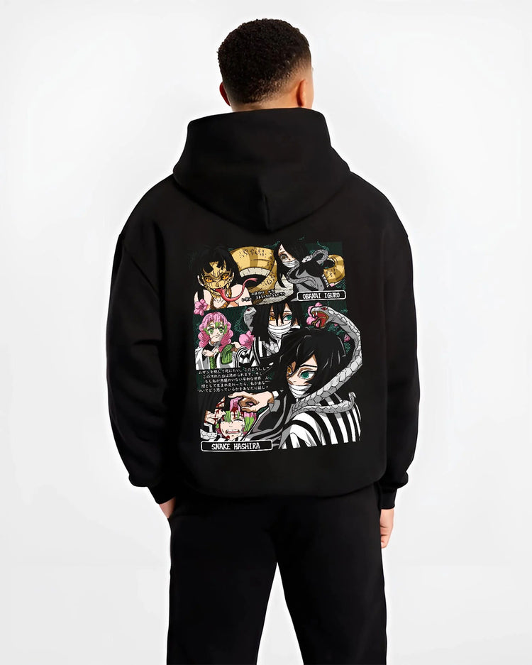 Black hoodie worn by male model from the back featuring Obanai Iguro Snake Hashira collage Demon Slayer artwork.