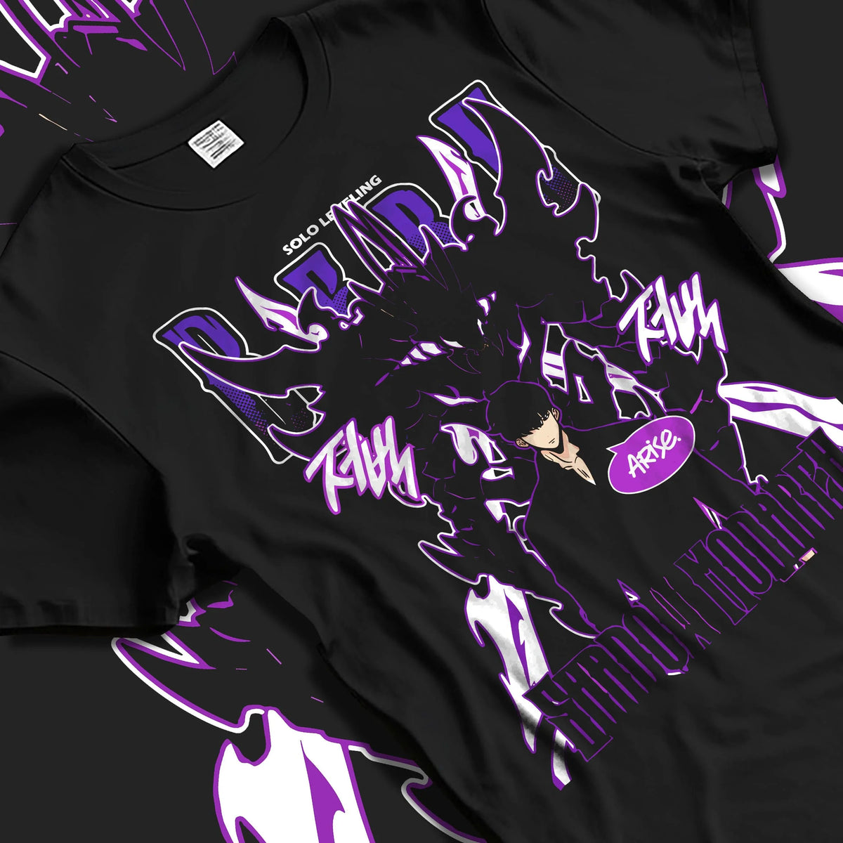 Black T-shirt laid flat with natural folds featuring Sung Jin-Woo Shadow Monarch purple aura Solo Leveling artwork.