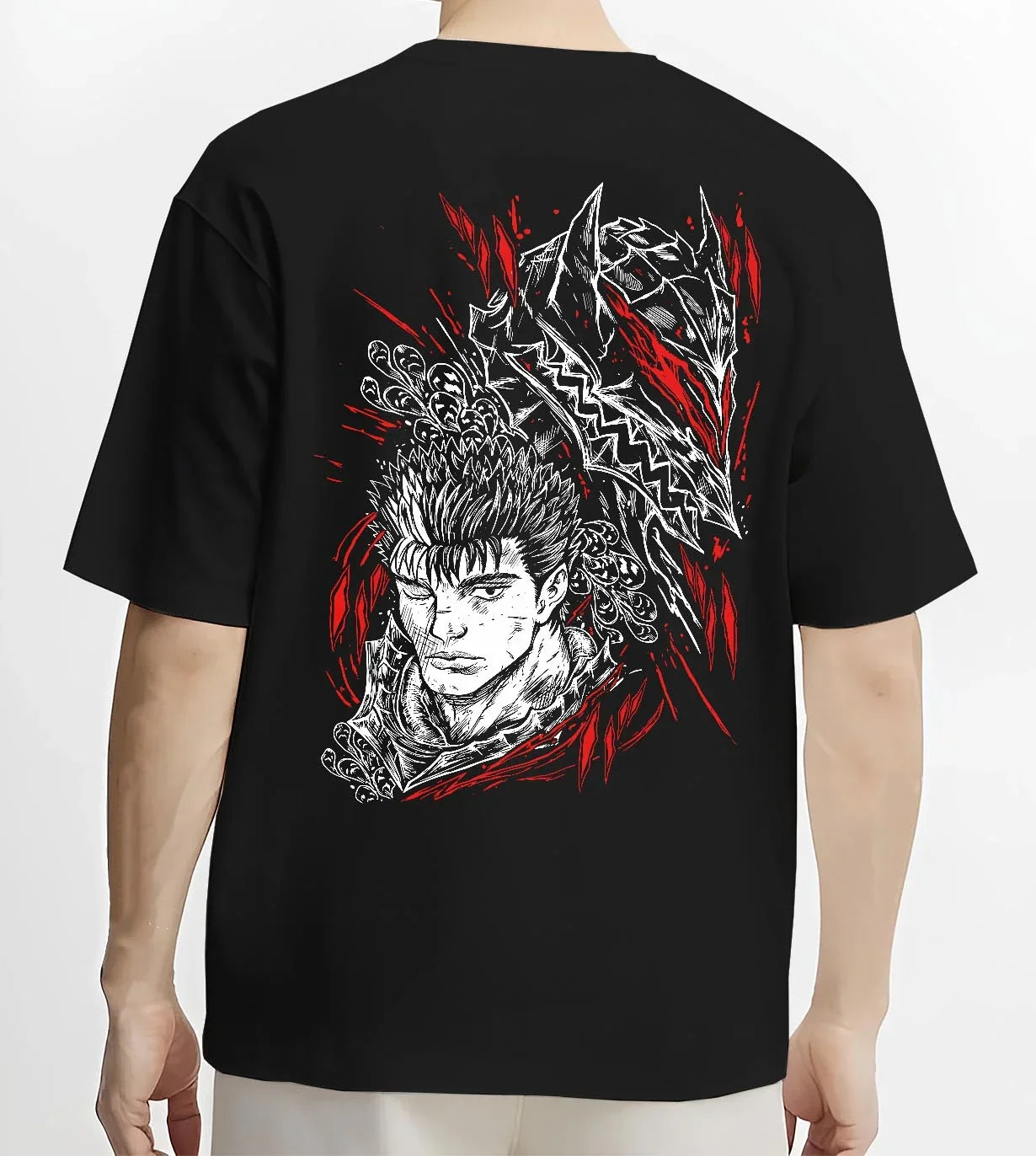 Black T-shirt worn by male model, back view with Guts Berserk Hoodie Wolf Knight Dark Swordsman Anime graphic bold anime graphic.