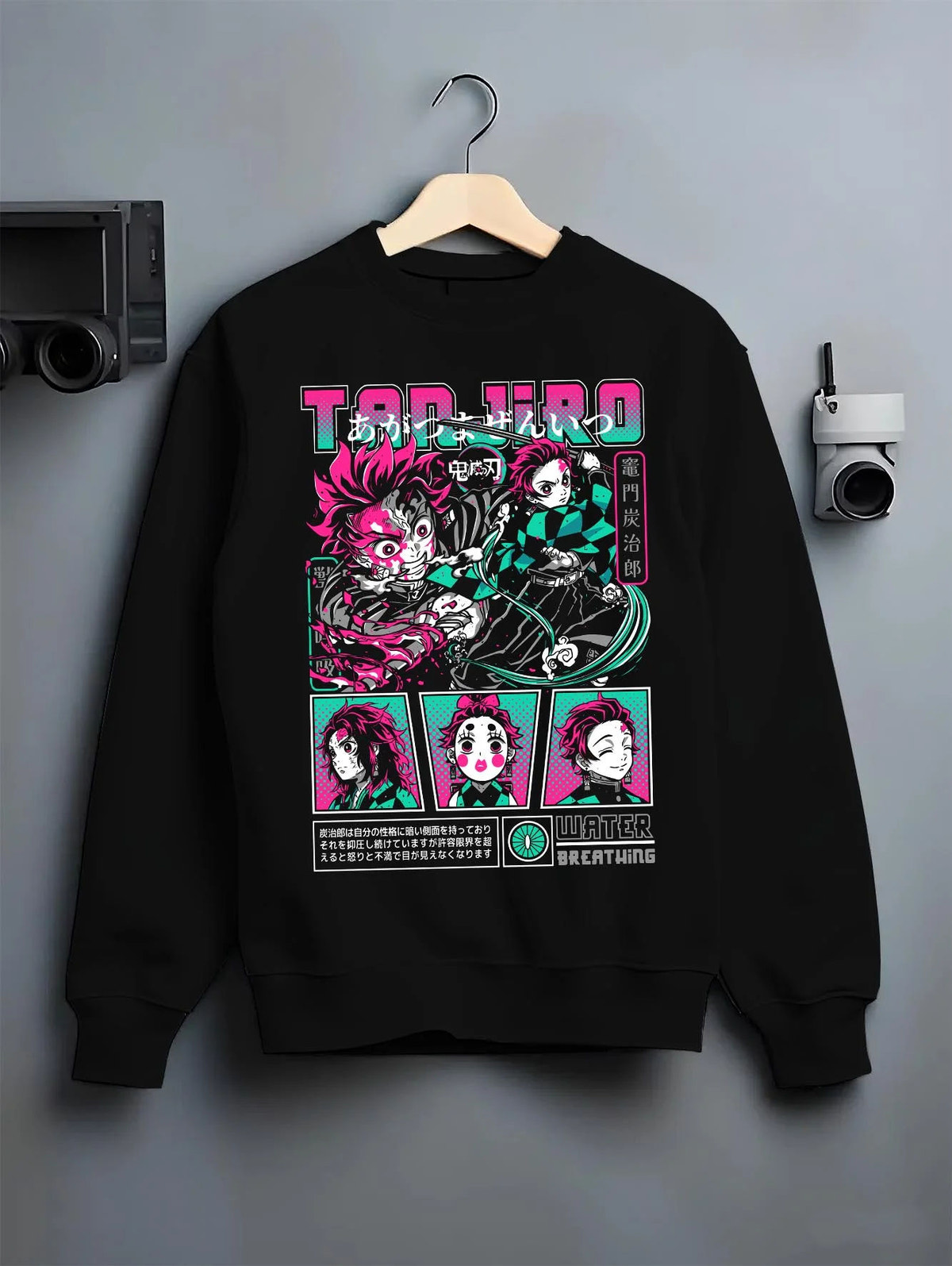 Black crewneck sweatshirt on hanger featuring Tanjiro Kamado Water Breathing collage Demon Slayer artwork.
