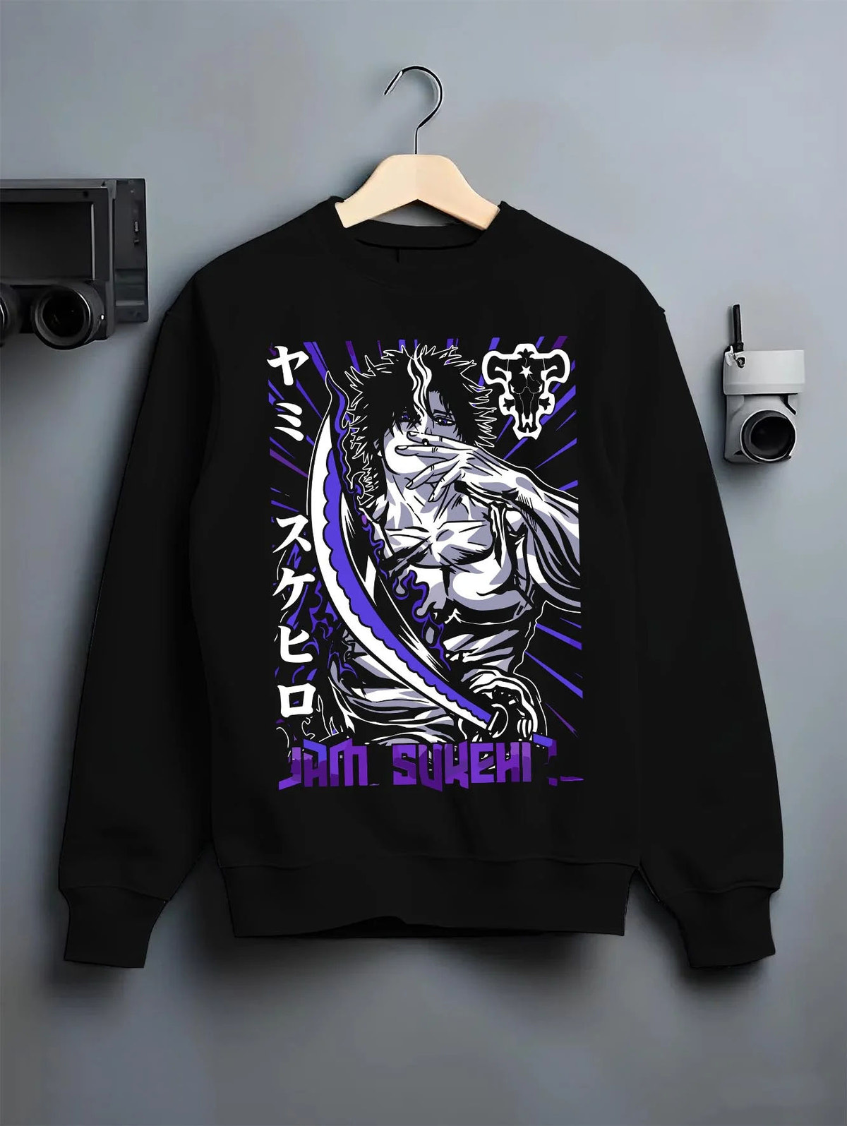 Black crewneck sweatshirt on hanger featuring Yami Sukehiro Dark Magic captain Black Clover artwork.