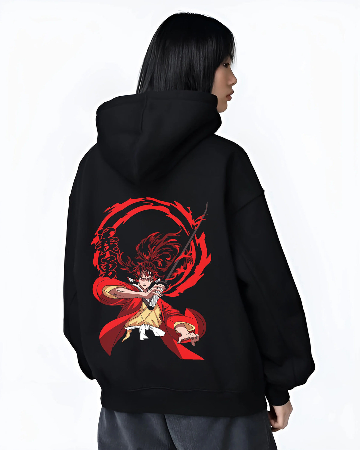 Black hoodie female model back view showing Yoriichi Tsugikuni from Demon Slayer: red sun-breathing sword attack