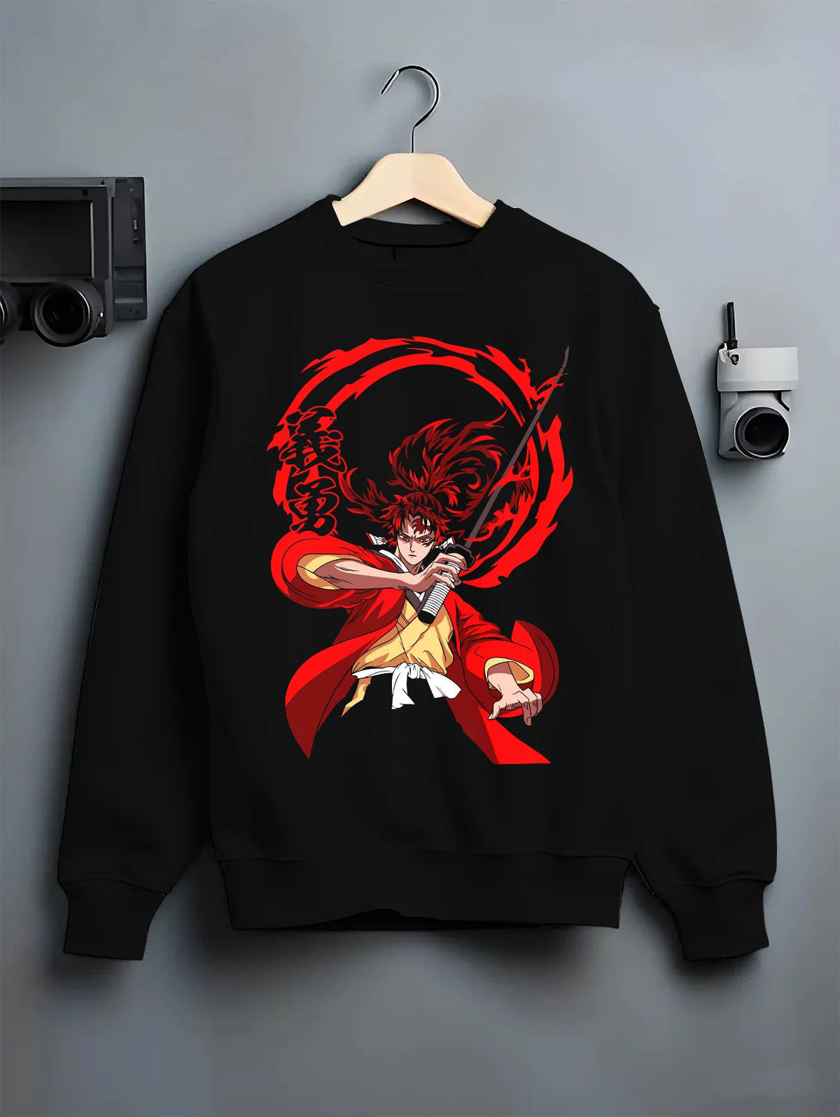 Black crewneck sweatshirt on hanger showing Yoriichi Tsugikuni from Demon Slayer: red sun-breathing sword attack