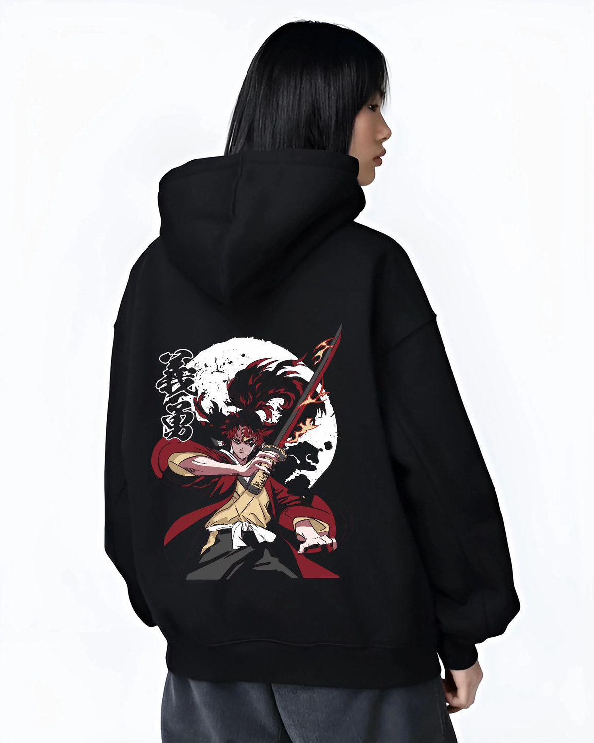Black hoodie worn by female model from the back featuring Yoriichi Tsugikuni Demon Slayer Mark artwork.