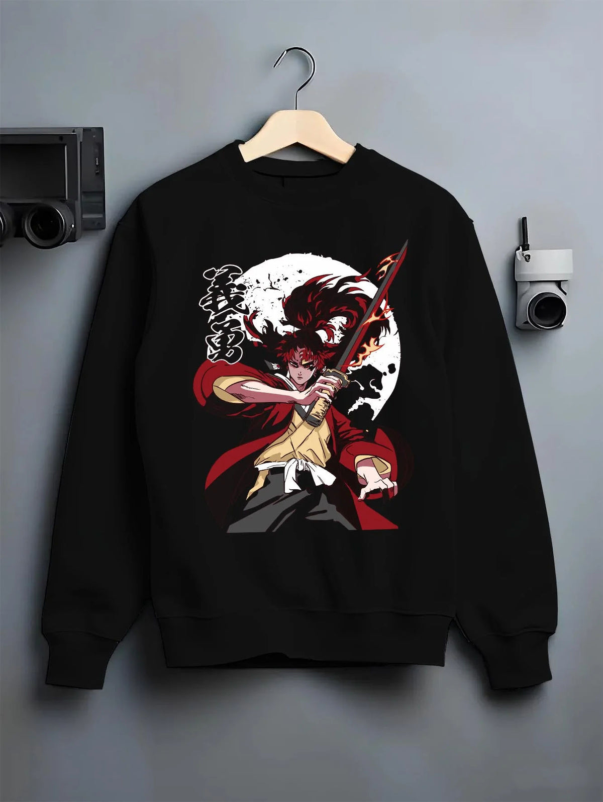 Black crewneck sweatshirt on hanger featuring Yoriichi Tsugikuni Demon Slayer Mark artwork.