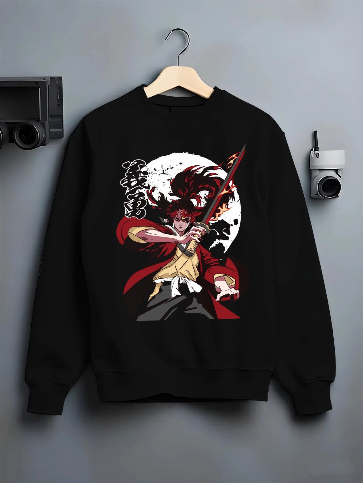 Black crewneck sweatshirt on hanger featuring Yoriichi Tsugikuni Demon Slayer Mark artwork.