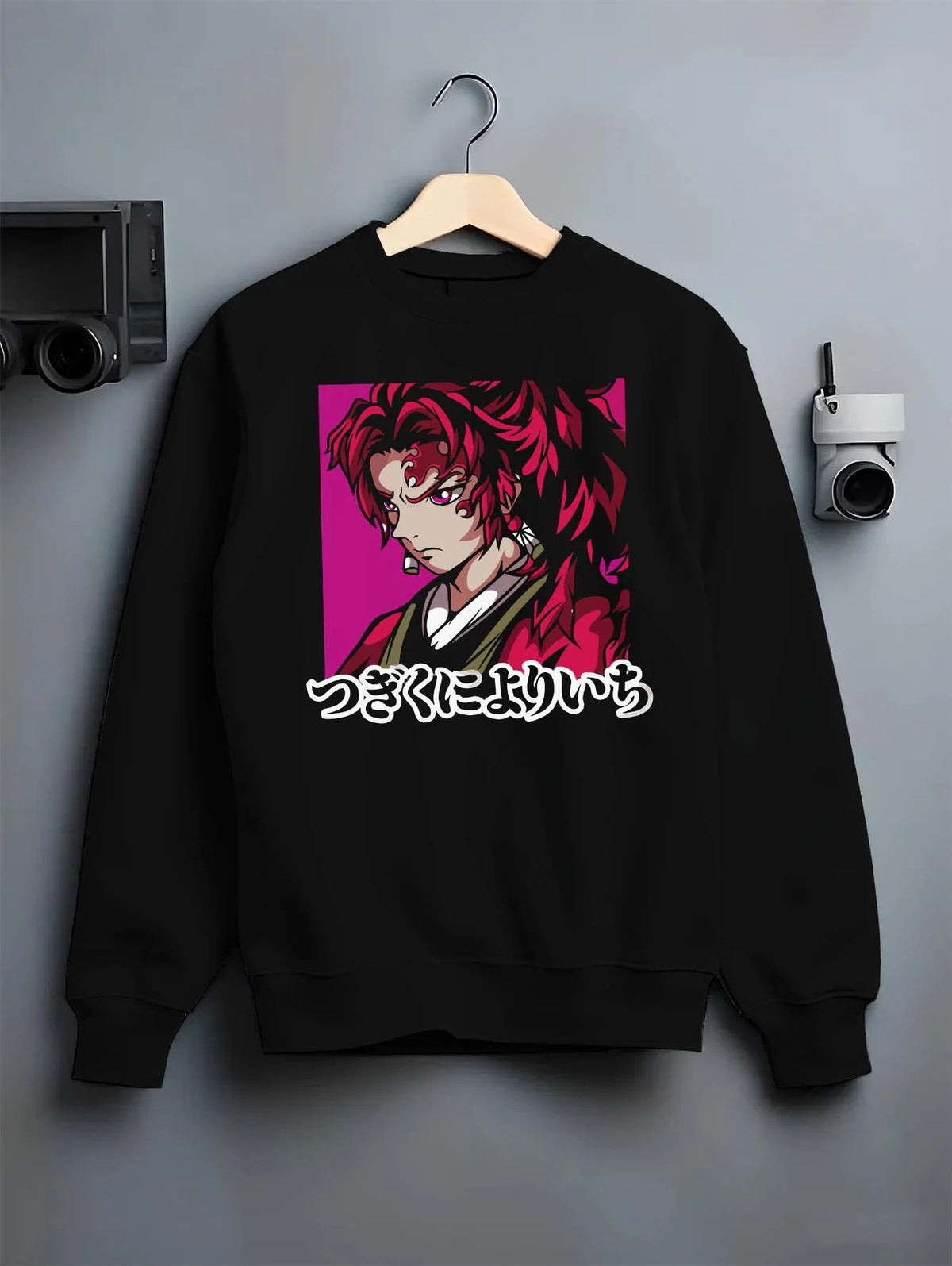 Black crewneck sweatshirt on hanger featuring Yoriichi Tsugikuni Sun Breathing sword Demon Slayer artwork.