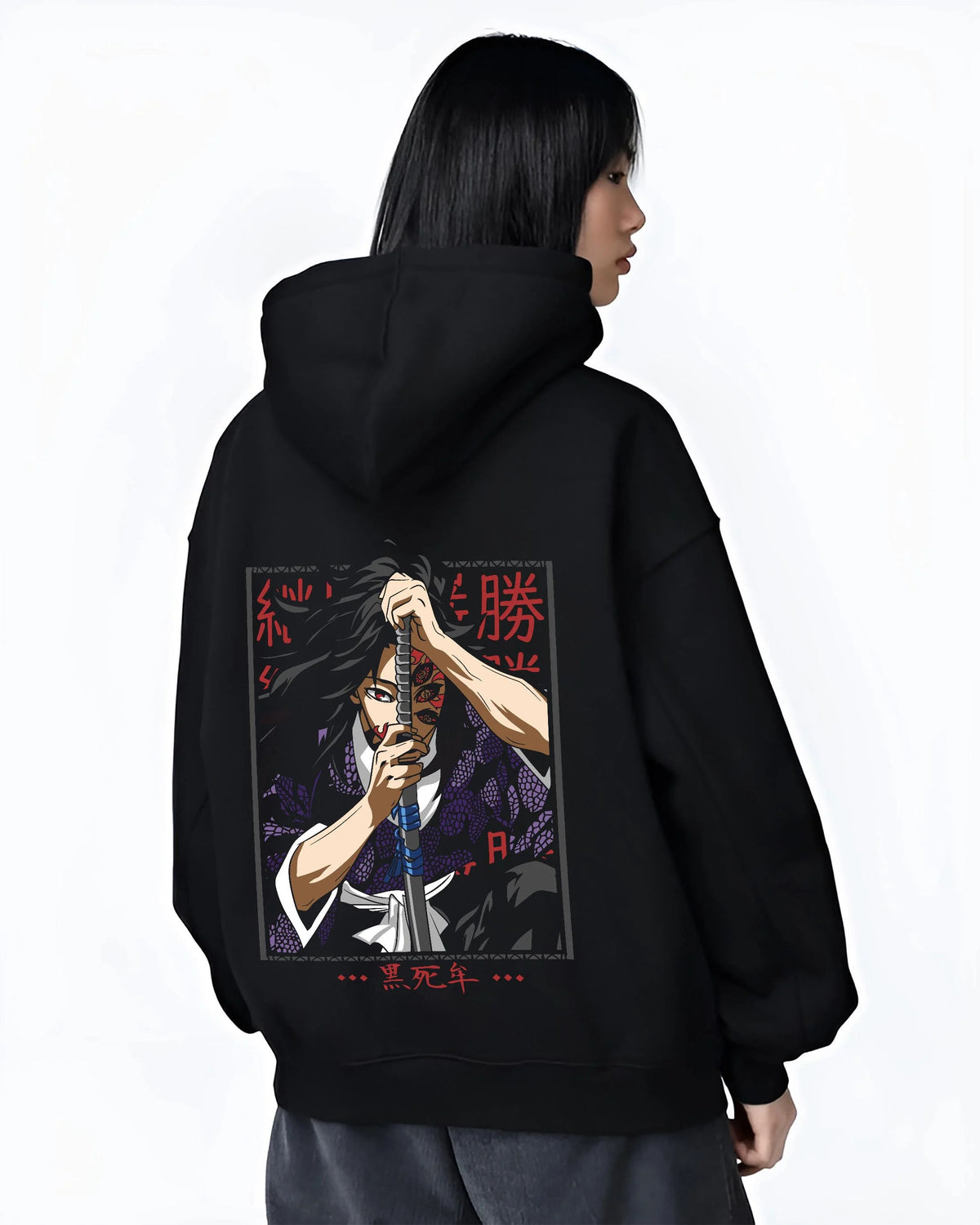 Black hoodie worn by female model from the back featuring Yoriichi Tsugikuni Sun Breathing flame aura Demon Slayer artwork.