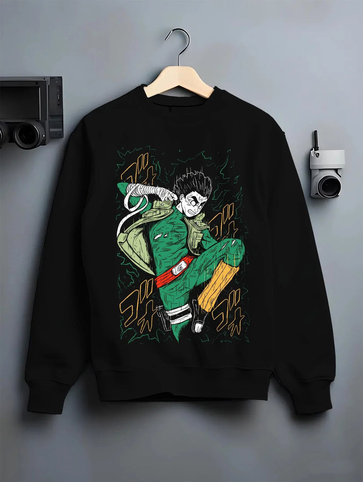 Black crewneck sweatshirt on hanger featuring Might Guy Power of Youth taijutsu Naruto artwork.