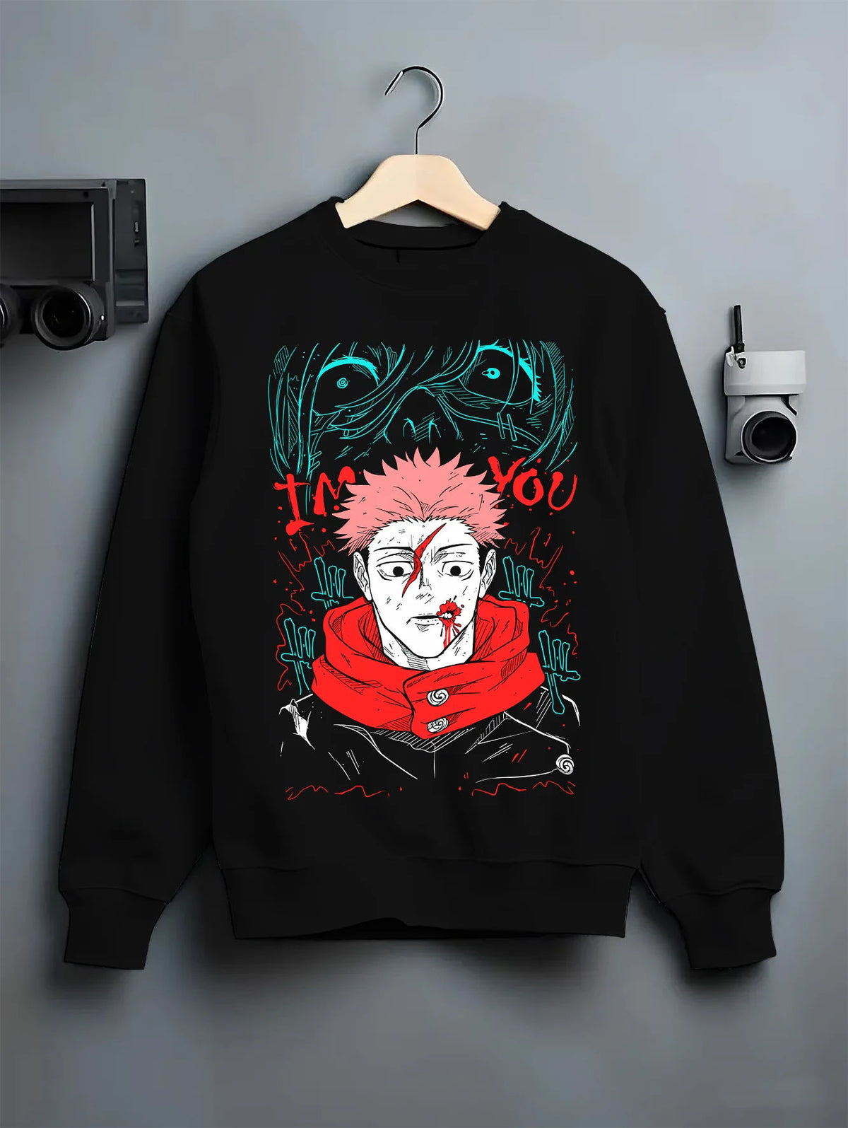 Black crewneck sweatshirt on hanger showing Yuji Itadori / Sukuna from Jujutsu Kaisen: scarred face red scarf artwork