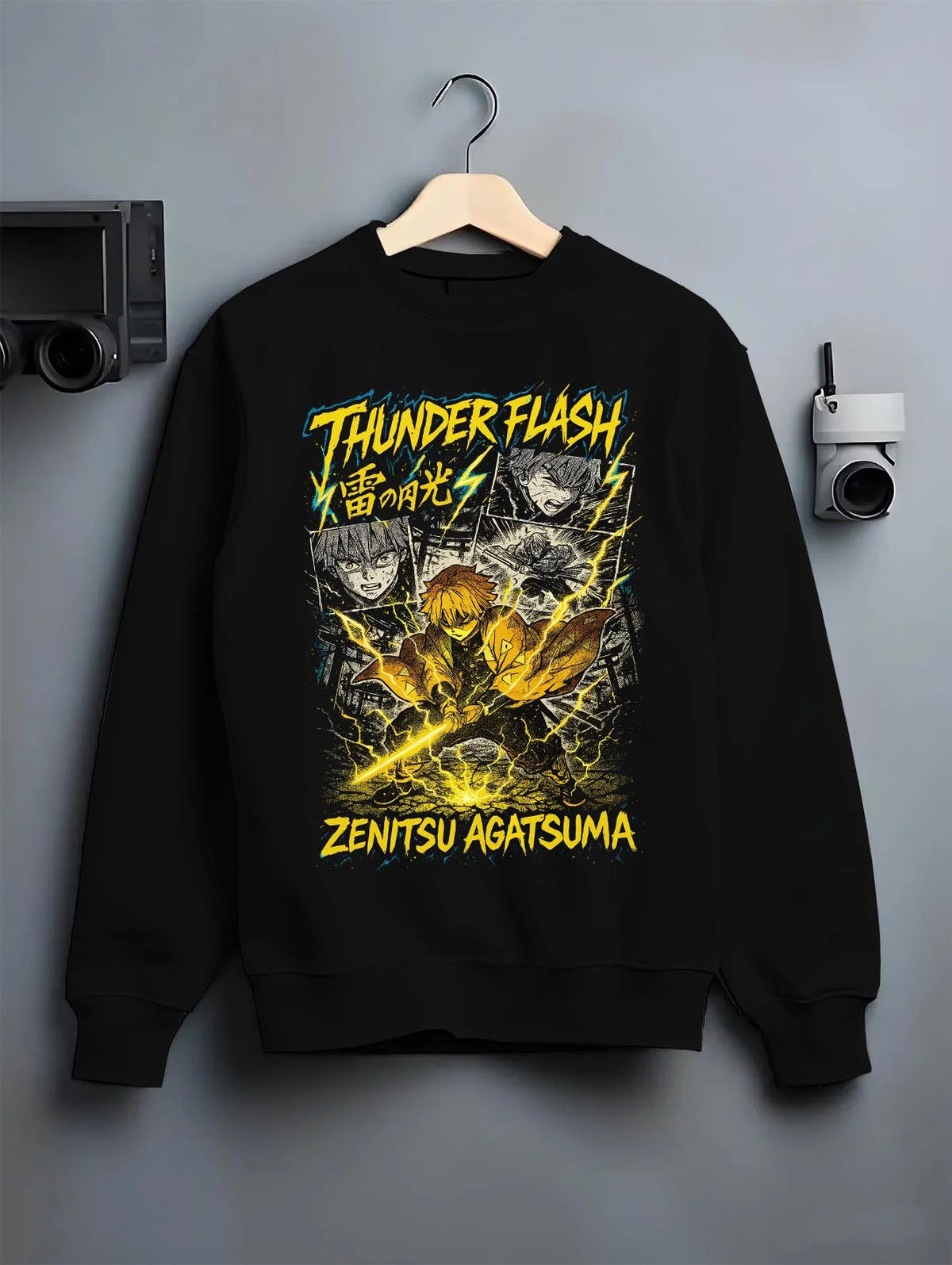 Black crewneck sweatshirt on hanger featuring Zenitsu Agatsuma thunder spark Demon Slayer artwork.