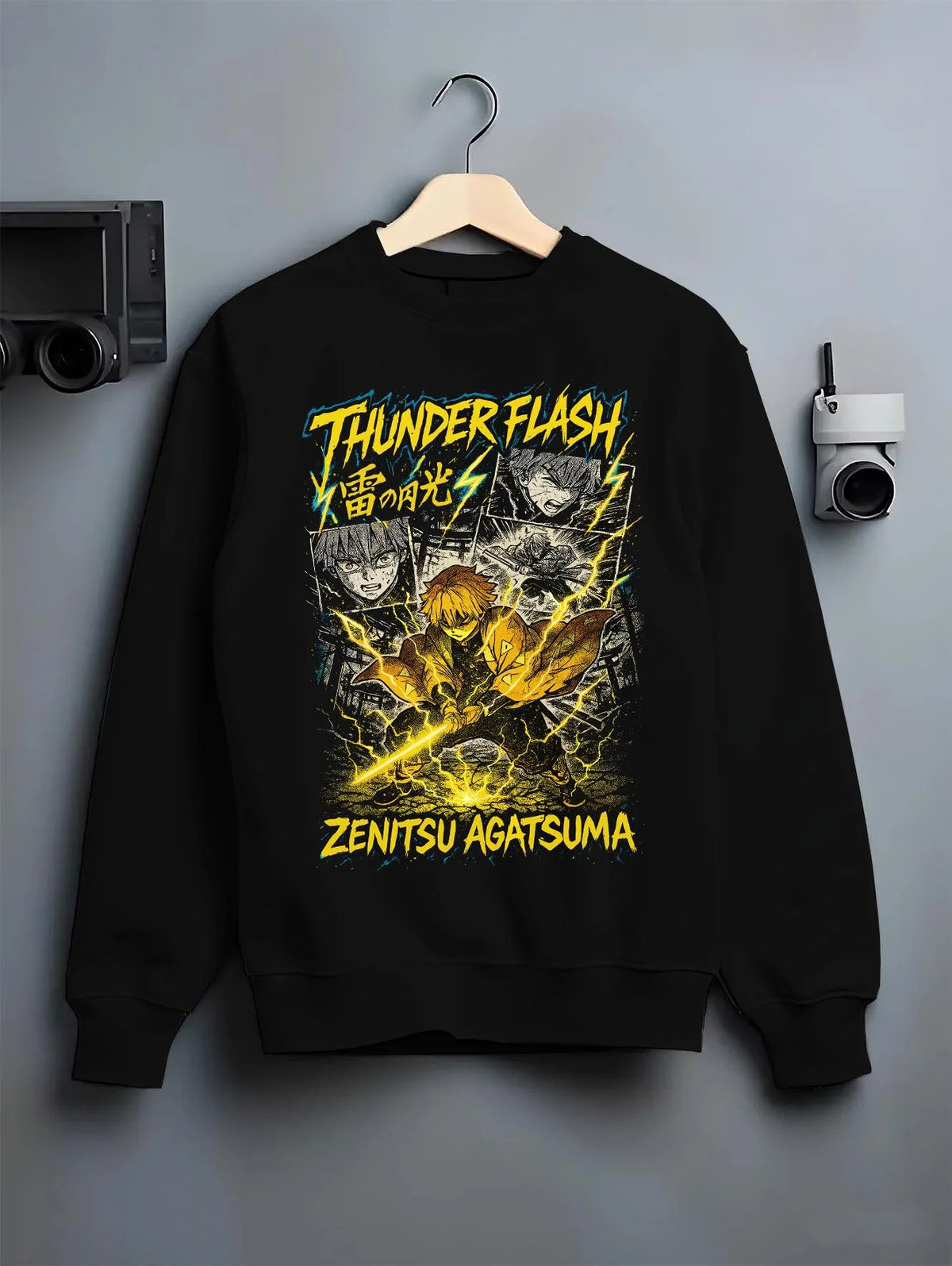 Black crewneck sweatshirt on hanger featuring Zenitsu Agatsuma thunder spark Demon Slayer artwork.