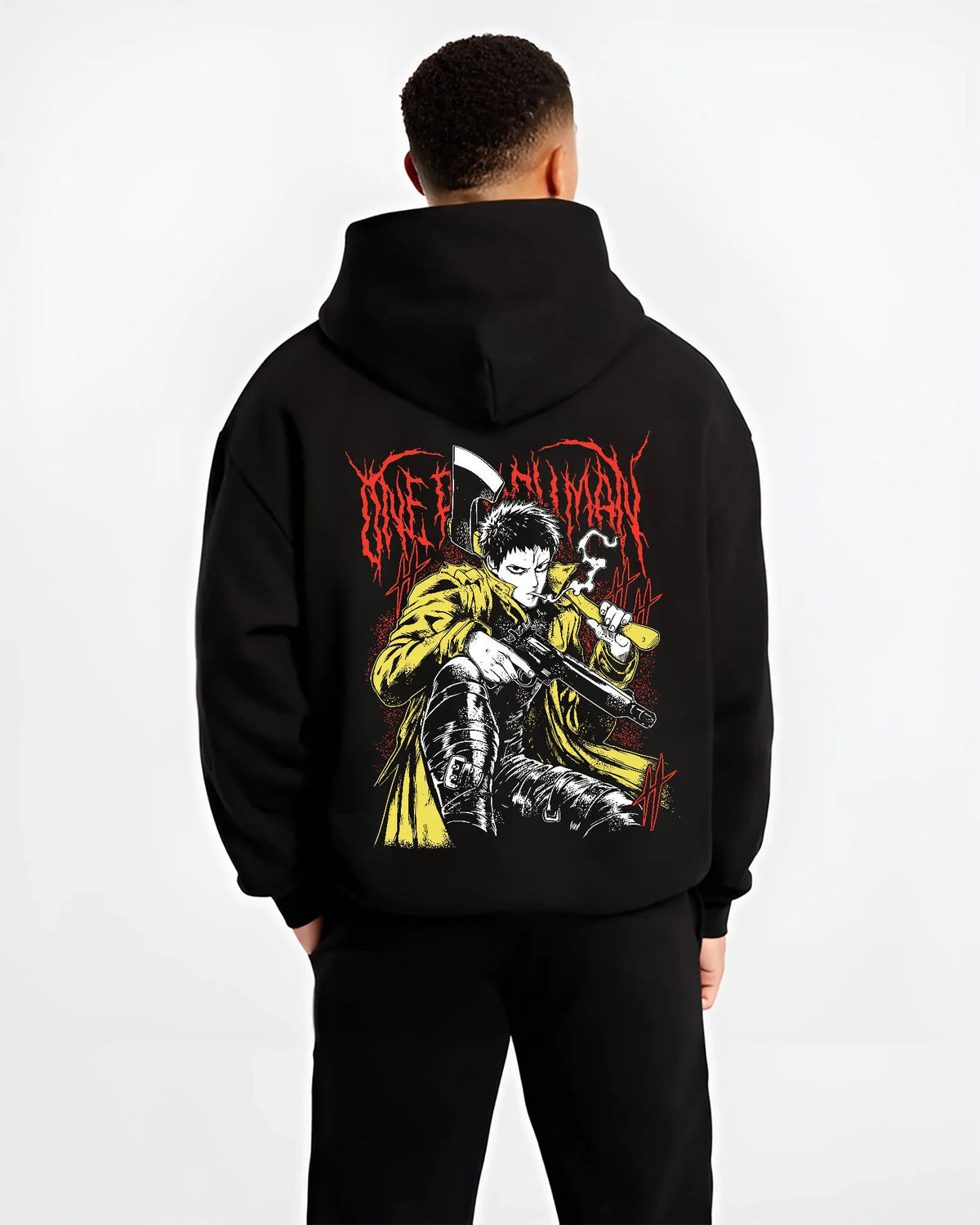Black hoodie model back view showing Zombieman from One Punch Man: seated firearm pose