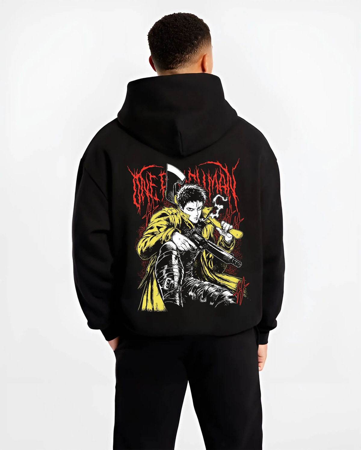 Black hoodie model back view showing Zombieman from One Punch Man: seated firearm pose