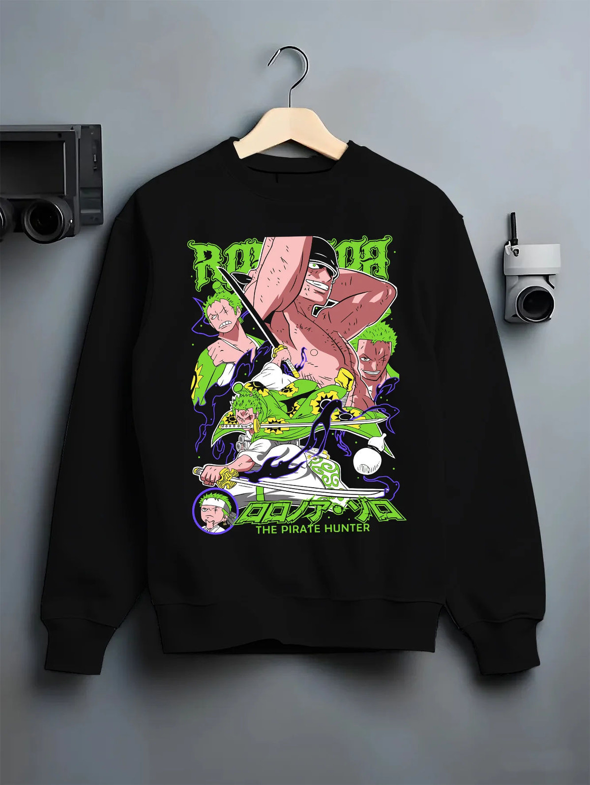 Black crewneck sweatshirt on hanger showing Roronoa Zoro from One Piece: green-haired swordsman composition