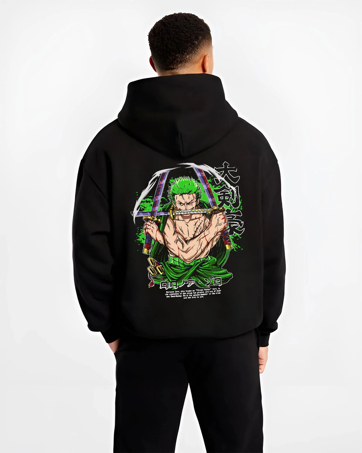 Black hoodie worn by male model from the back featuring Roronoa Zoro bandana Three Sword Style One Piece artwork.
