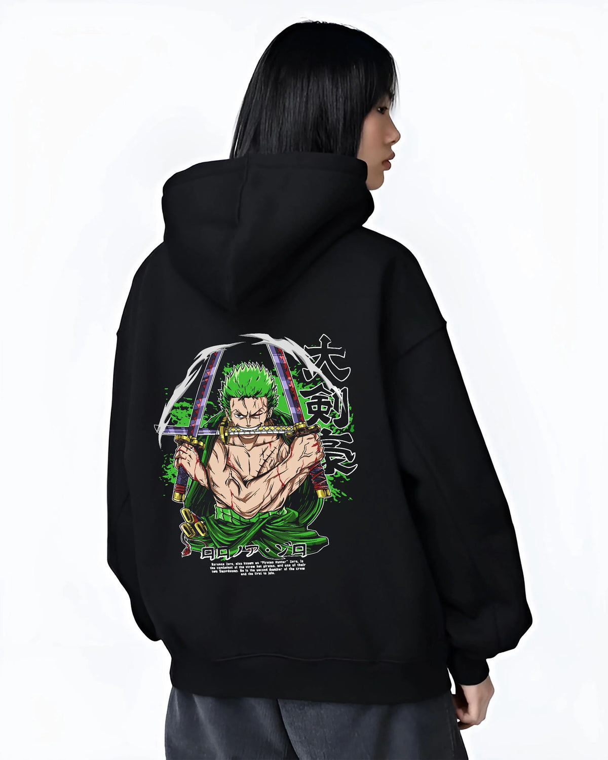 Black hoodie worn by female model from the back featuring Roronoa Zoro bandana Three Sword Style One Piece artwork.