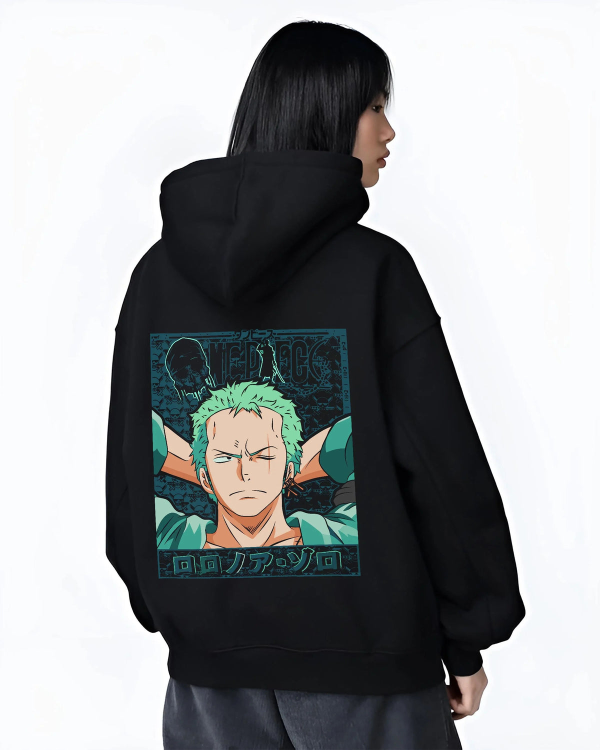 Black hoodie worn by female model from the back featuring Roronoa Zoro green hair swordsman One Piece artwork.