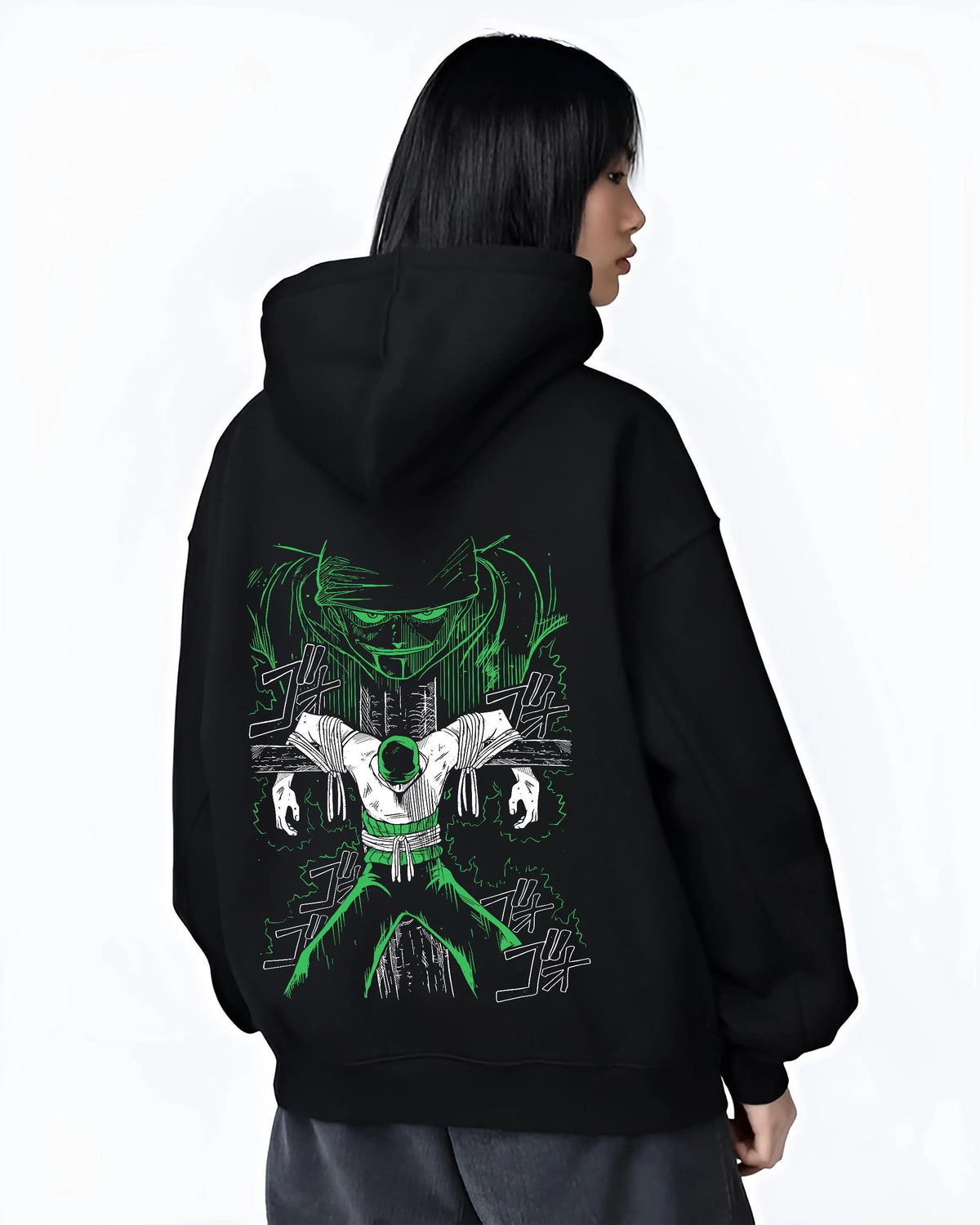 Black hoodie worn by female model from the back featuring Roronoa Zoro swordsman portrait One Piece artwork.