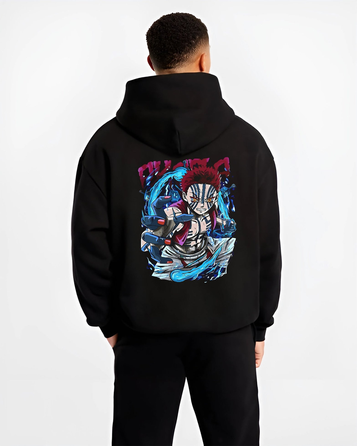 Black hoodie worn by a male model, back view, featuring Akaza Demon Slayer retro manga graphic with striking energy effects and Japanese animation streetwear design.