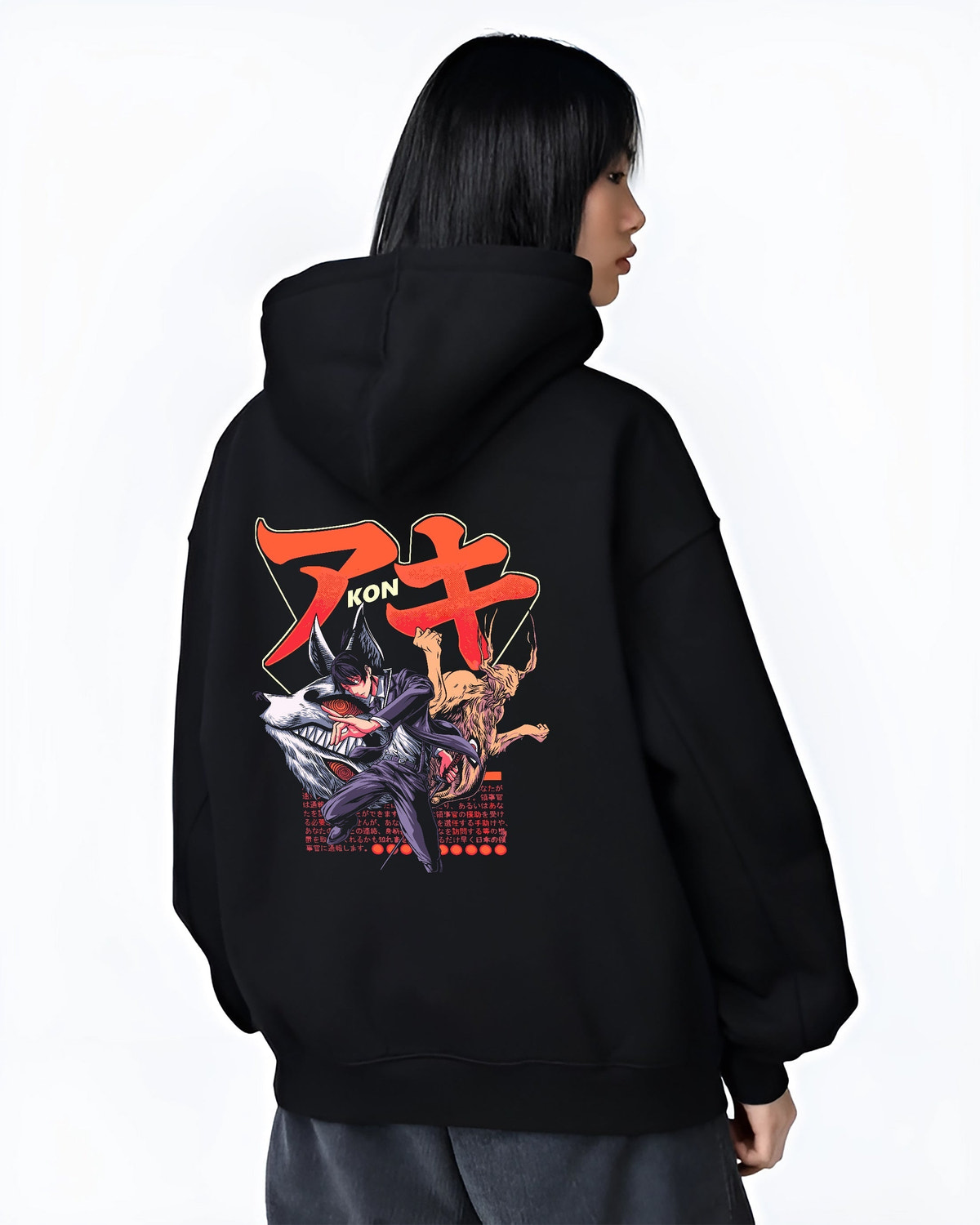 Black hoodie worn by a female model, back view, featuring Aki Chainsaw Man anime poster inspired artwork with fox devil attack in urban fashion back design.