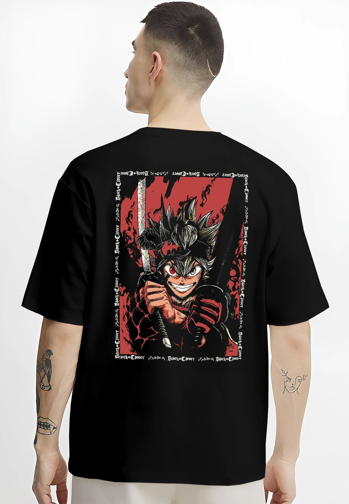 Black T-shirt worn by a male model, back view, featuring Asta Black Clover anime poster inspired shonen battle design with sword raised and fiery manga red aura.