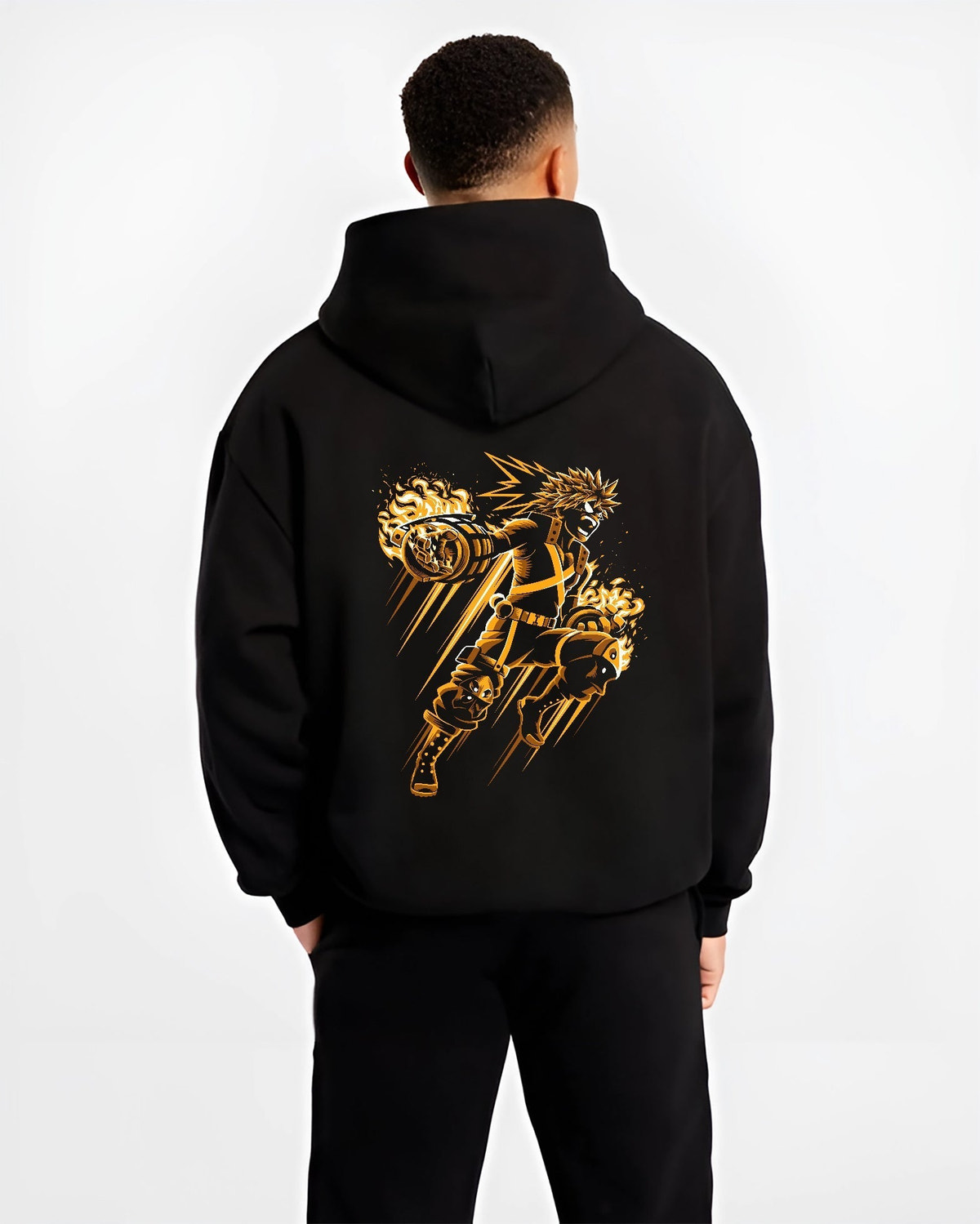 Black hoodie on male model, back view, Bakugo shonen battle design with explosive gauntlets, motion streaks, and bright flame effects.