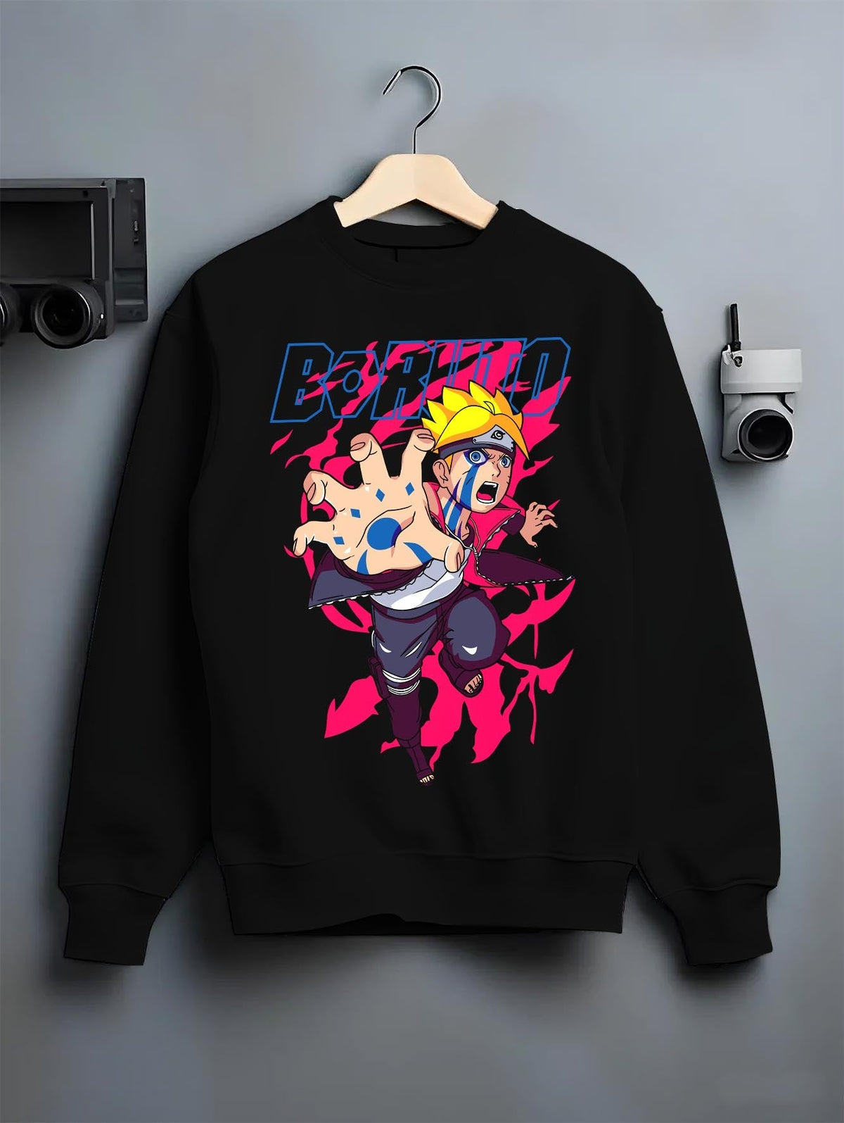 Black crewneck sweatshirt on hanger, featuring Boruto streetwear graphic with blue Karma marks and a striking neon pink aura.