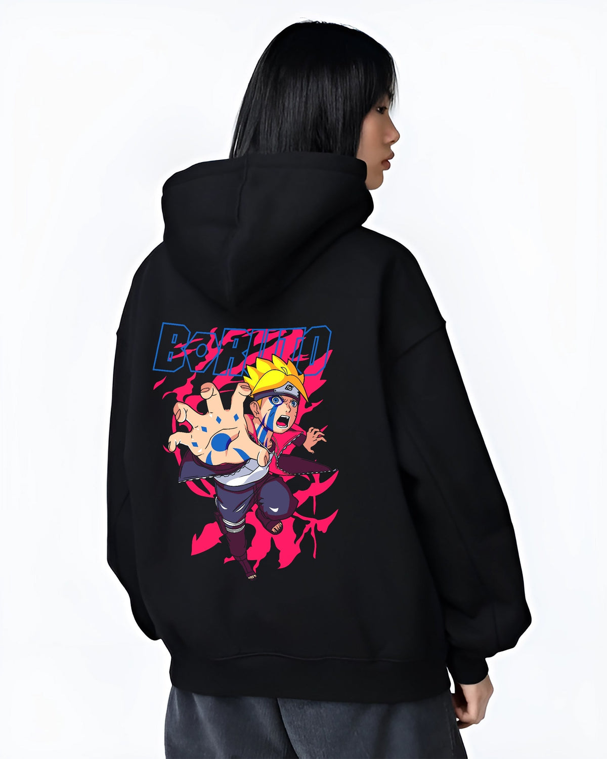 Black hoodie on female model, back view, featuring Boruto Japanese animation streetwear graphic with blue Karma marks and neon pink aura.