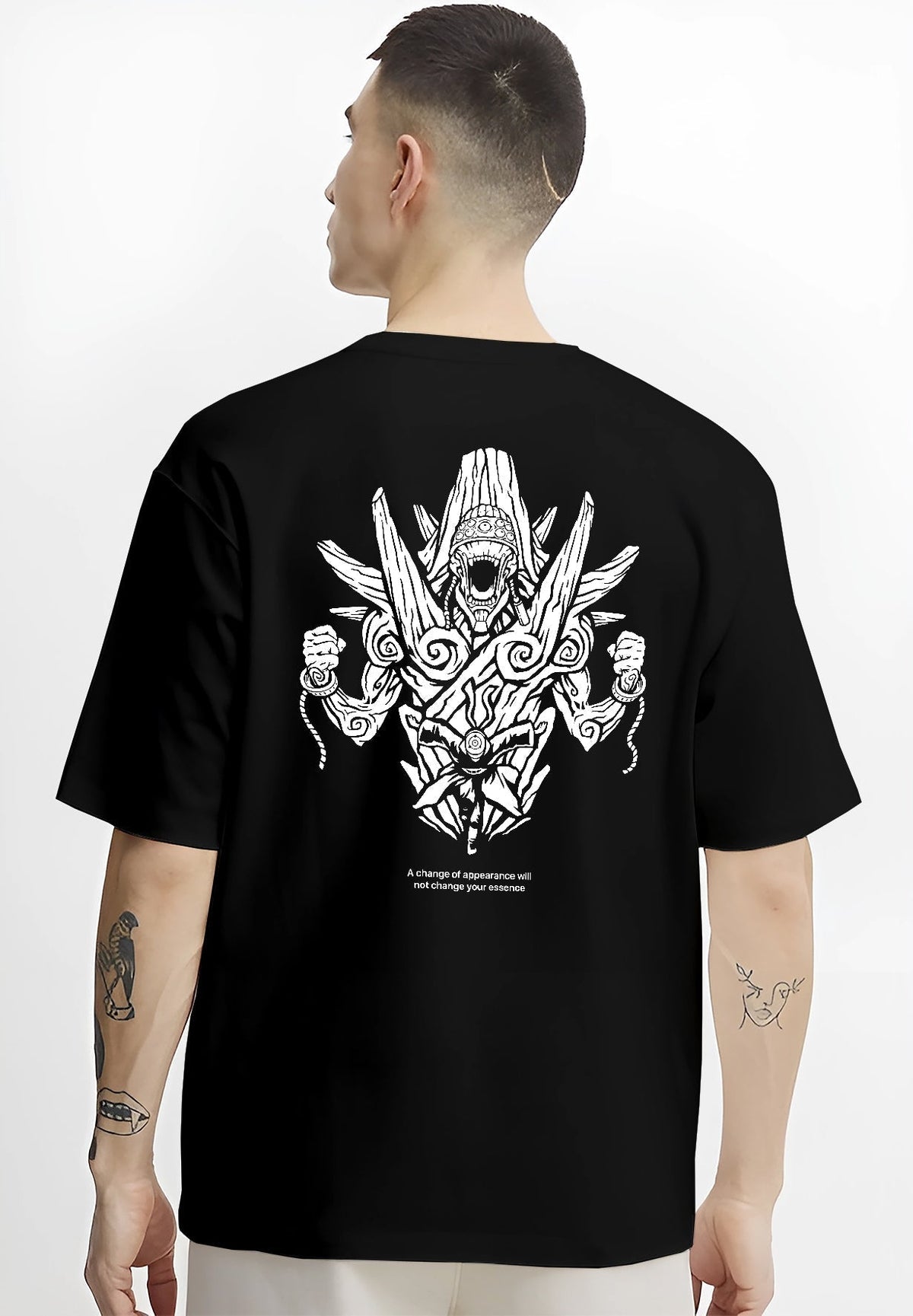 Black T-shirt on male model, back view, featuring retro manga graphic of demon guardian statue with swirling aura and intricate line-work.