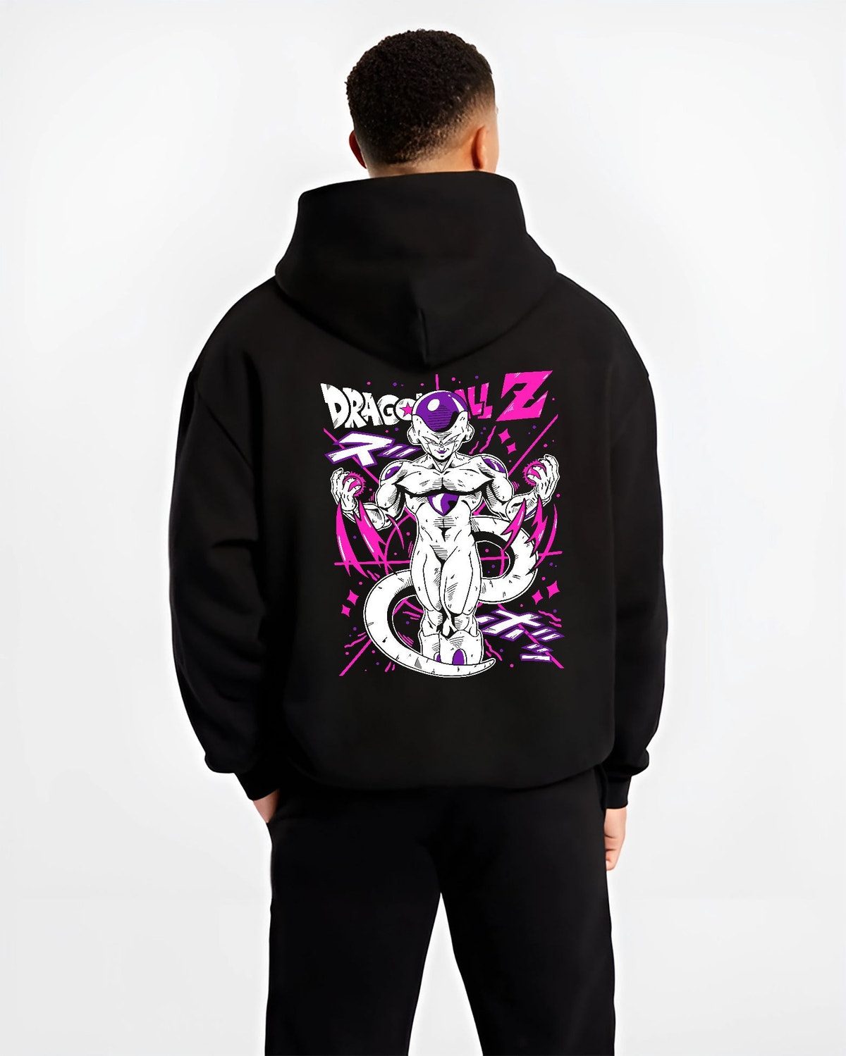 Black hoodie worn by a male model, back view, featuring Frieza Dragon Ball Z retro manga graphic with striking purple aura in Japanese animation streetwear style.
