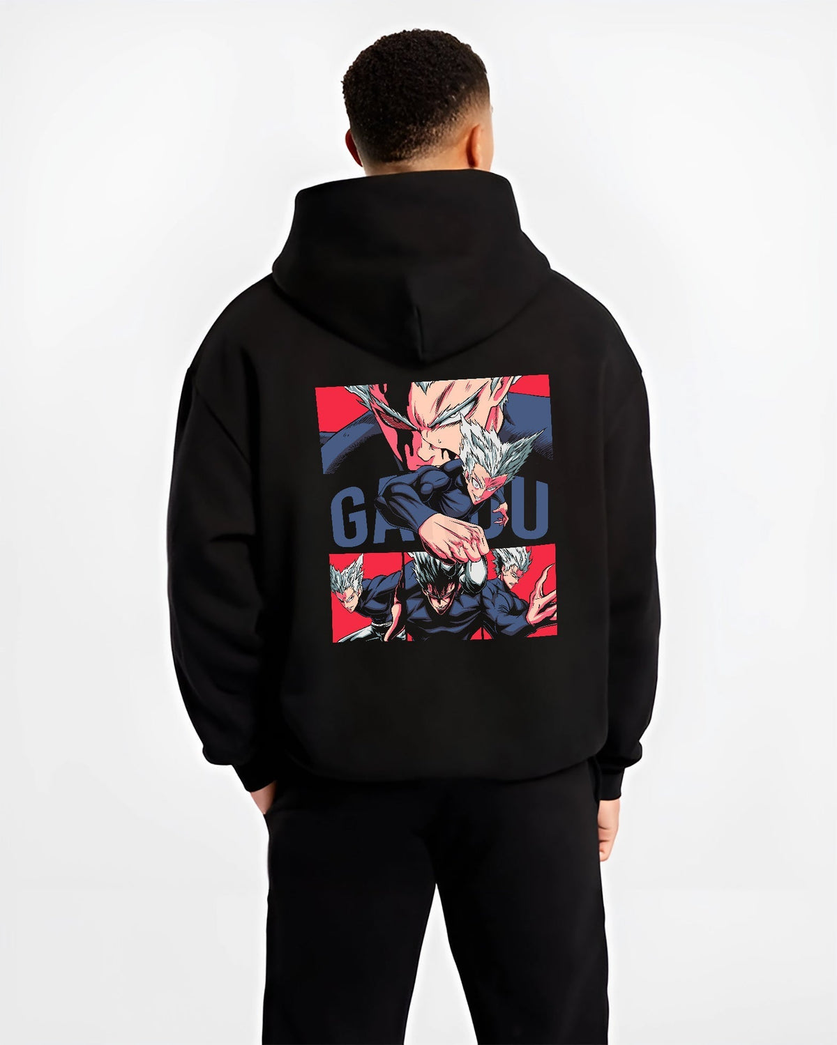 Black hoodie on male model, back view, showing Garou shonen battle character in retro manga panels with striking red background.