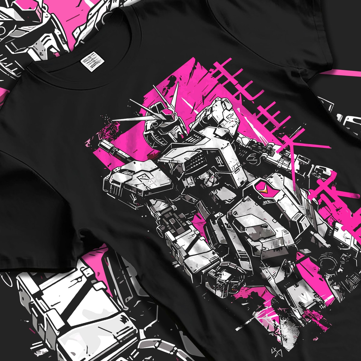Black T-shirt laid flat with soft folds, featuring Gundam retro manga graphic over vivid pink panel with Japanese text.