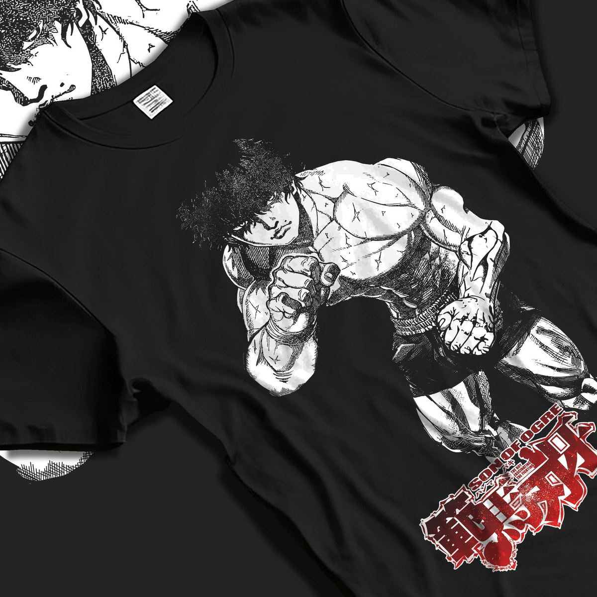 Black T-shirt laid flat with natural fabric folds, featuring Baki Hanma Son of Ogre shonen battle character artwork in retro manga poster inspired design.
