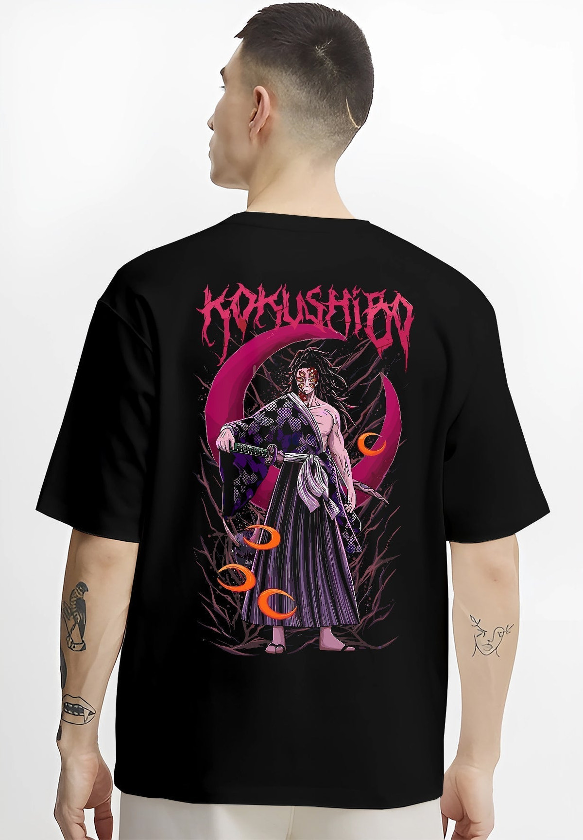 Black T-shirt worn by a male model, back view, featuring Kokushibo Demon Slayer anime poster inspired design with glowing crescent moon and retro Japanese battle graphic.
