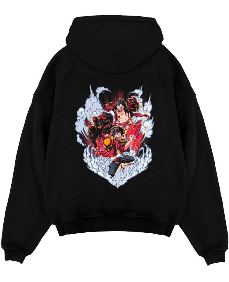 Black pullover hoodie laid flat on white, featuring One Piece Luffy Gear form battle graphic with smoke clouds, red lightning, retro manga style.