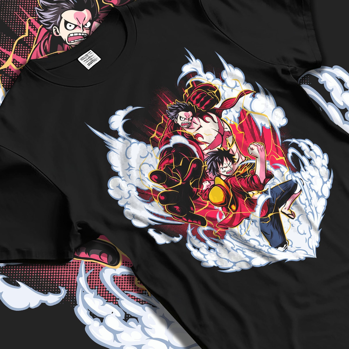 Black T-shirt laid flat with soft folds, featuring One Piece Luffy Gear fight retro manga design with smoke clouds and red lightning.