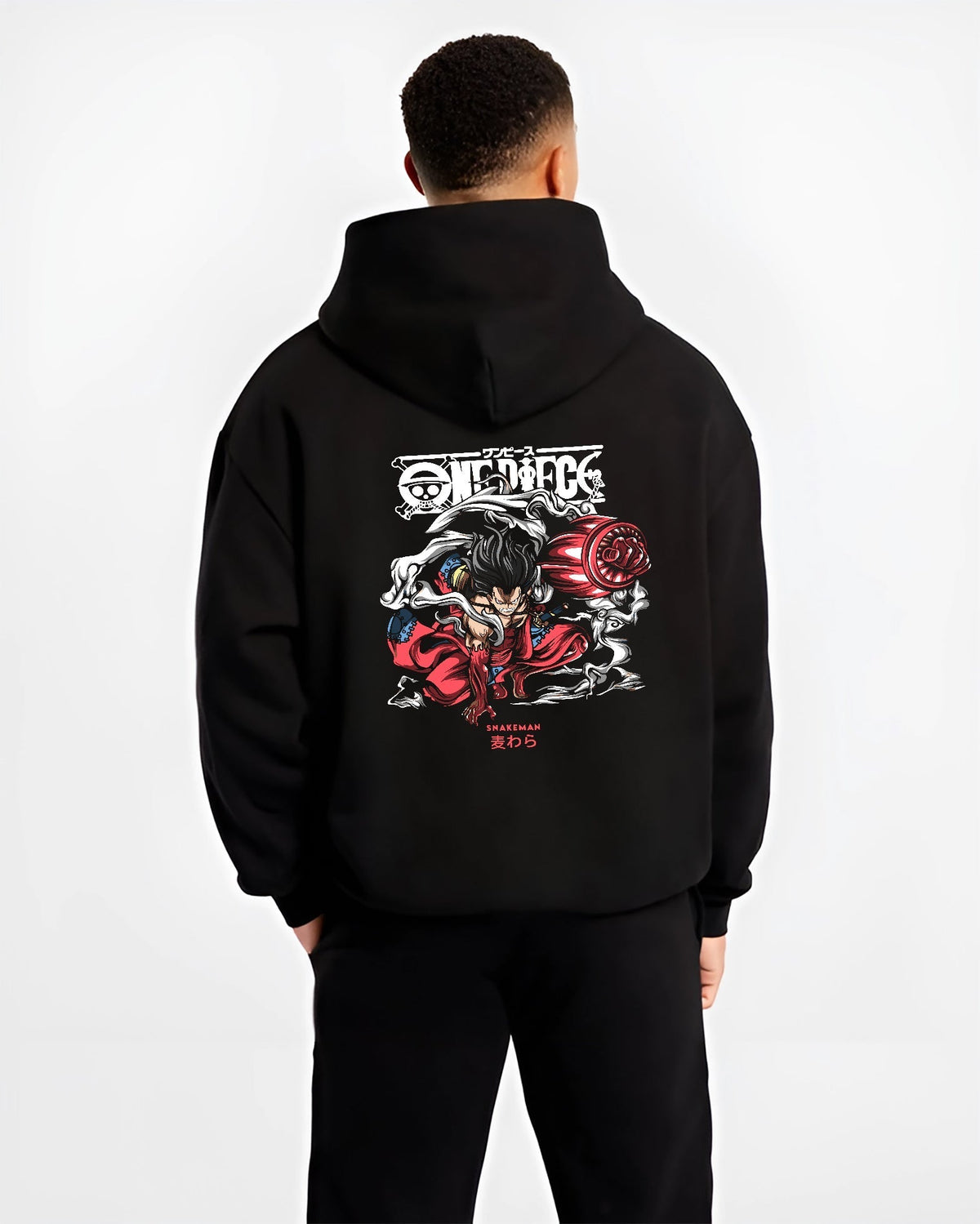 Black hoodie on male model, back view, featuring One Piece Luffy Snakeman shonen battle graphic with smoky effects and striking red highlights.
