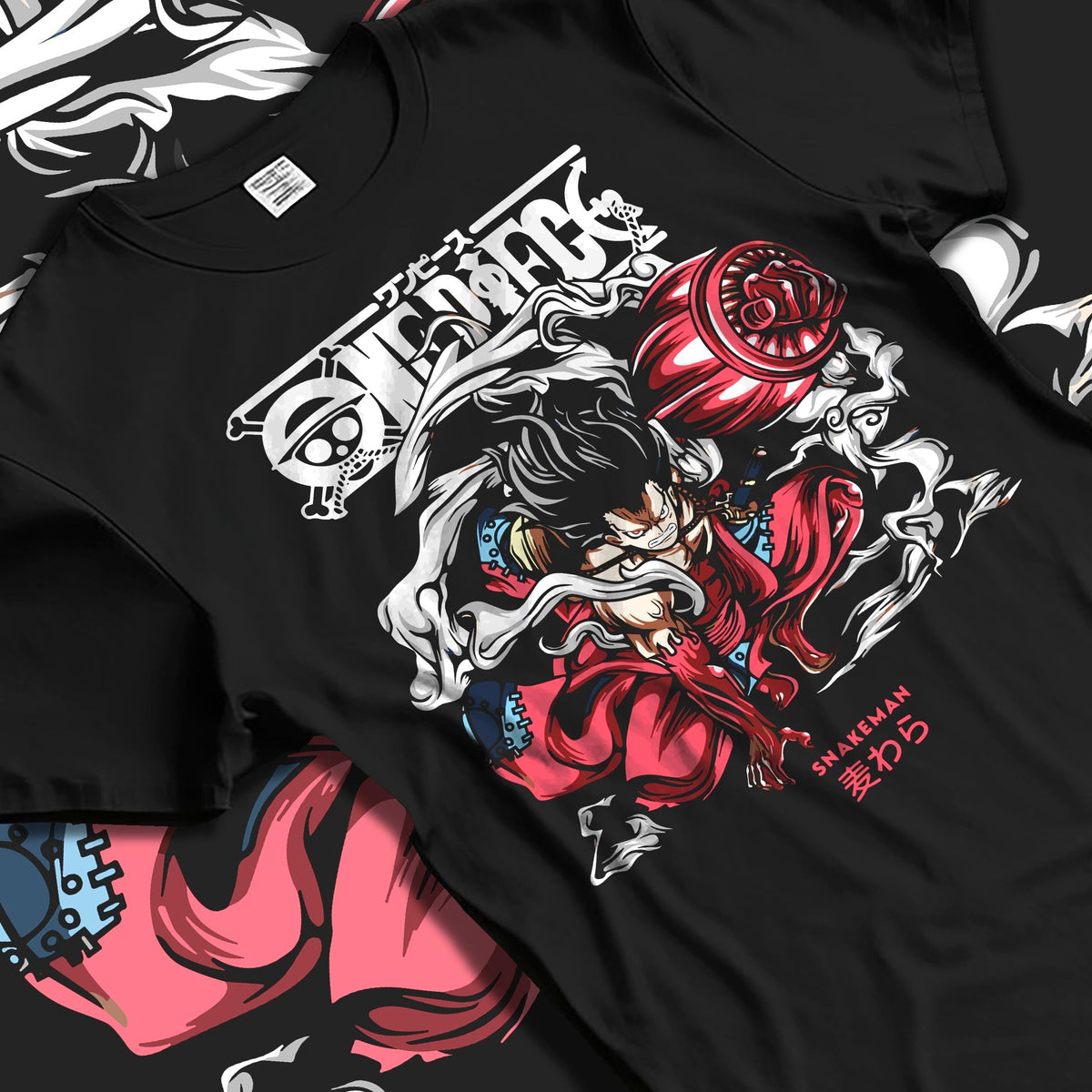 Black T-shirt laid flat with natural folds, featuring Luffy Snakeman anime poster back design with smoky aura and red highlights.
