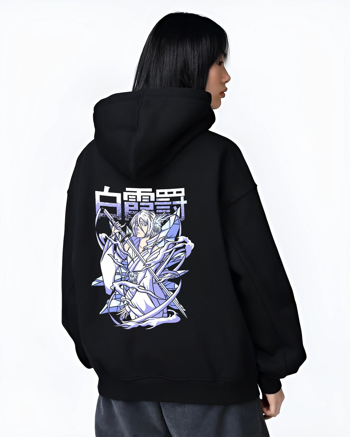 Black hoodie worn by a female model, back view, featuring Rukia Kuchiki Bleach Bankai icy anime poster inspired design with manga graphic artwork
