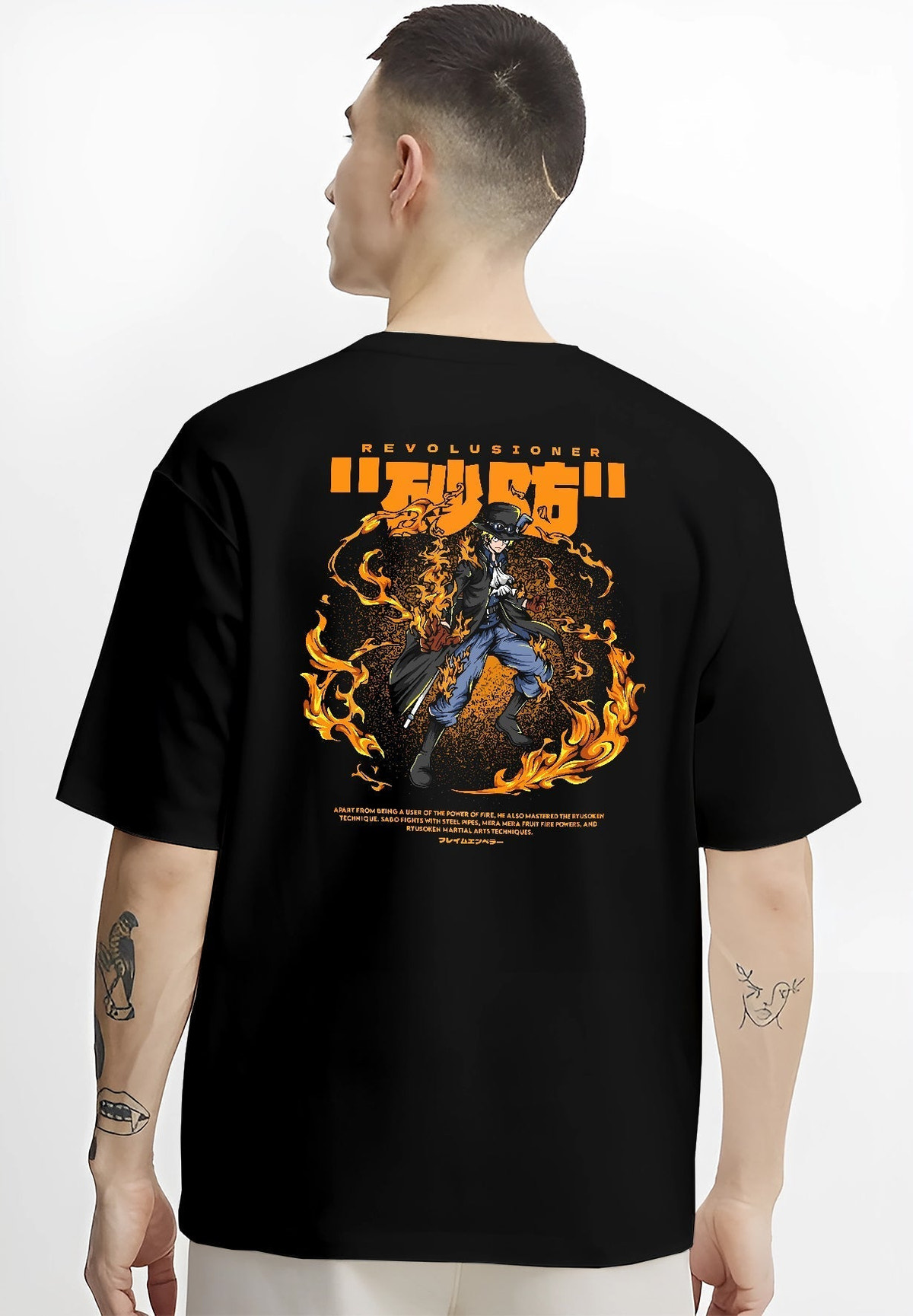 Black T-shirt worn by a male model, back view, featuring Sabo One Piece fiery shonen battle retro manga anime poster inspired graphic design