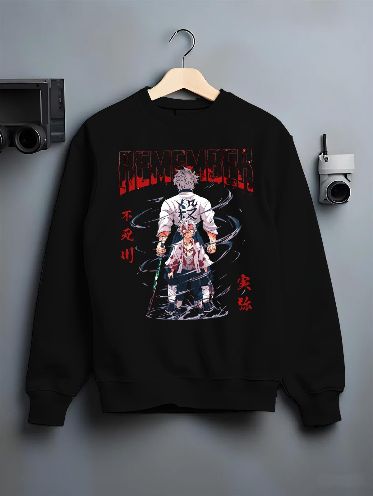 Black crewneck sweatshirt on a hanger against a grey wall, featuring Sanemi Demon Slayer retro streetwear graphic with emotional manga panel and dramatic anime detail.