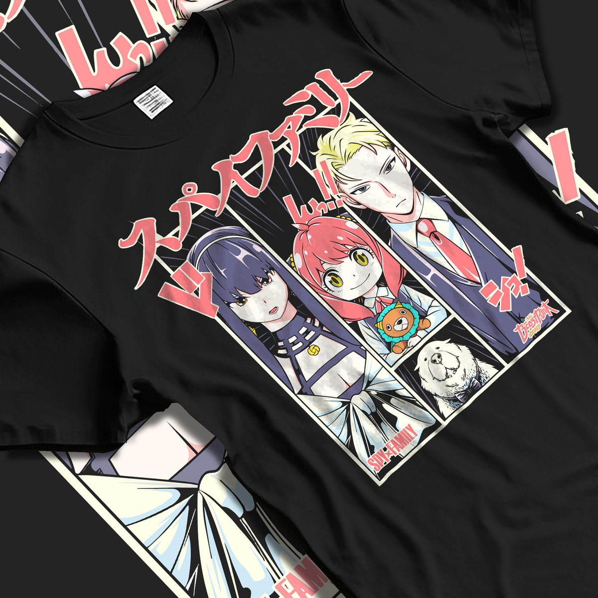 Black T-shirt laid flat with soft folds, featuring Spy x Family retro manga panel graphic of Yor, Anya, and Loid.