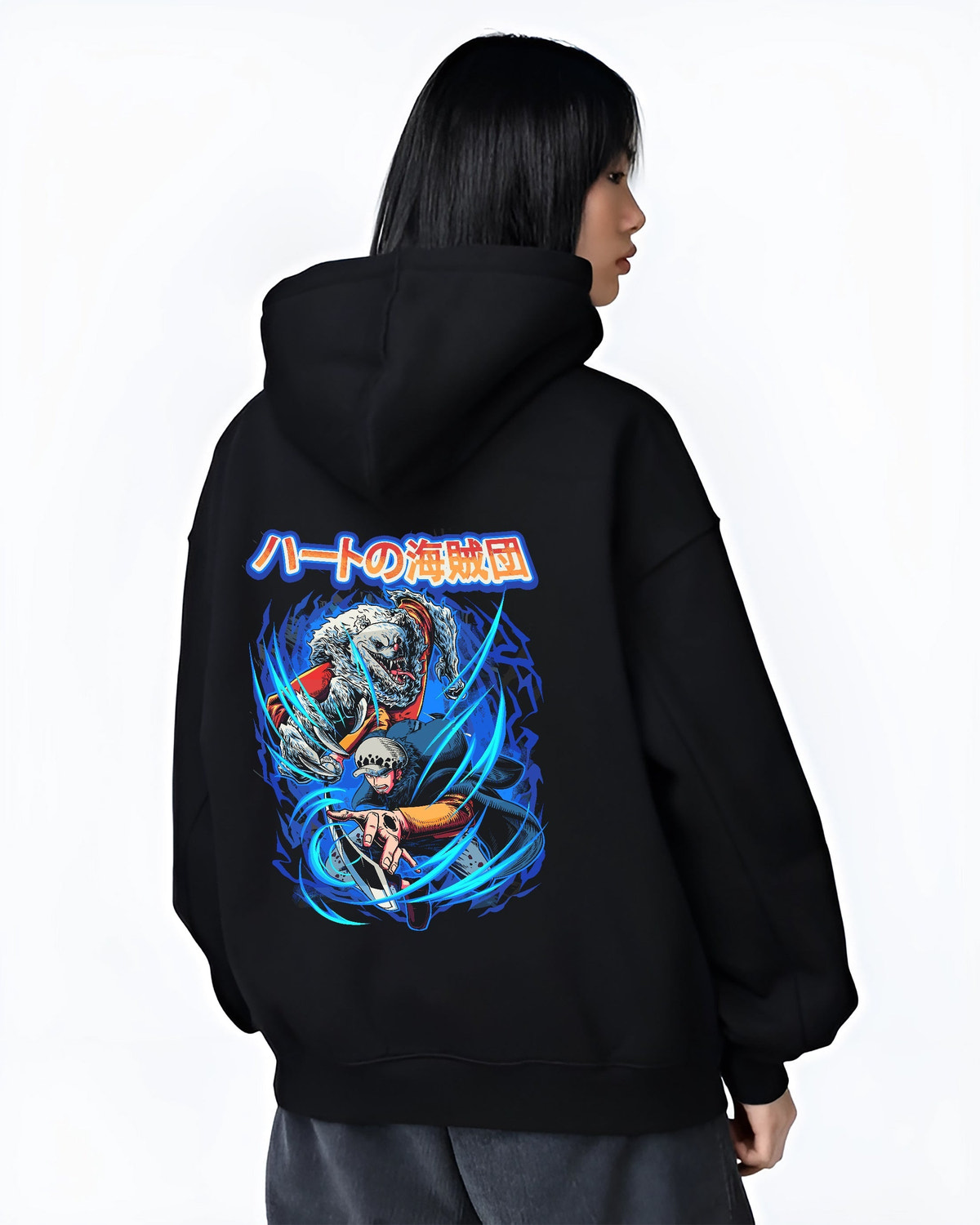 Black hoodie on female model, back view, Trafalgar Law and Bepo retro manga graphic surrounded by vivid blue energy trails and Japanese text.