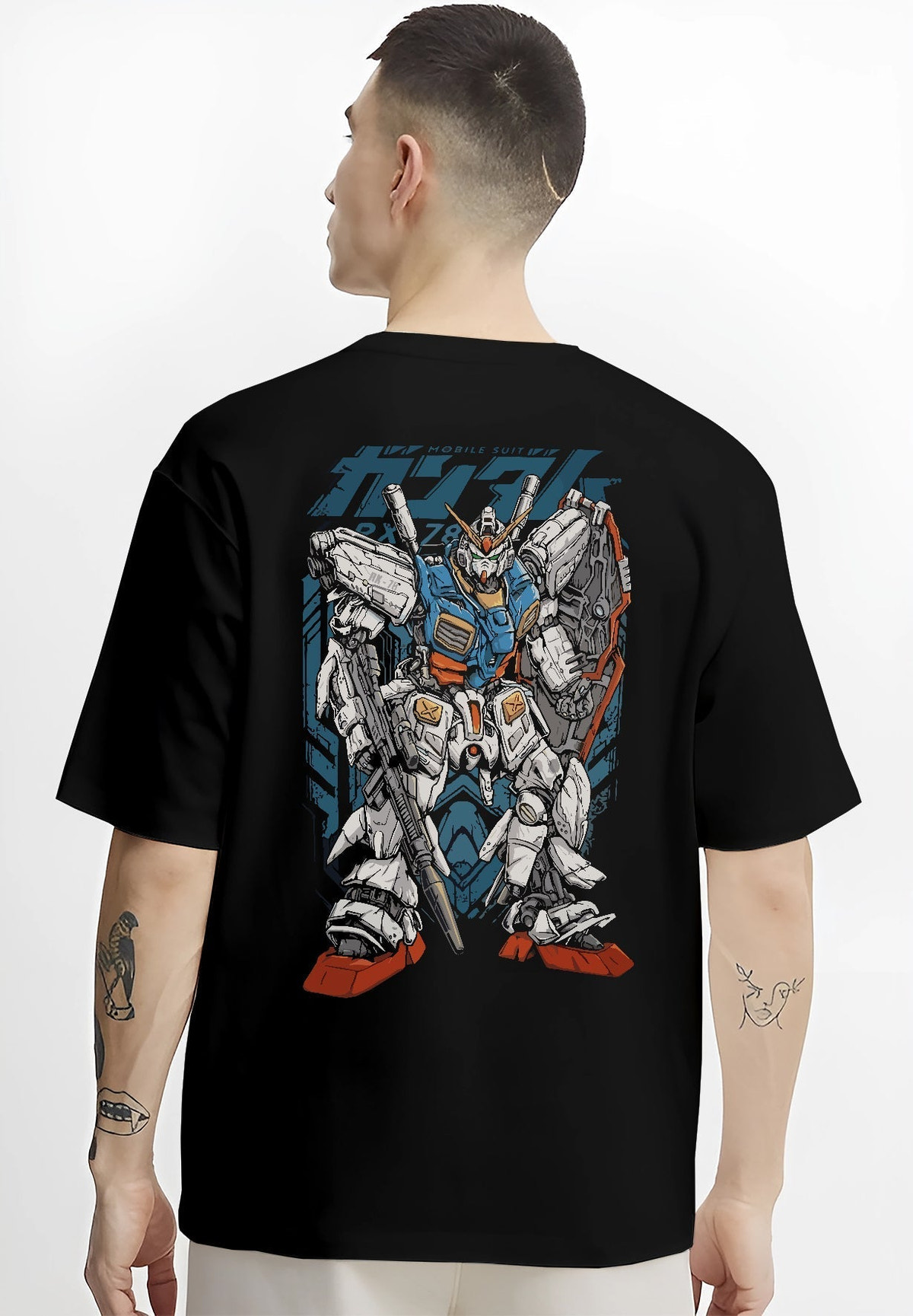 Black T-shirt worn by a male model, back view, featuring Zeta Gundam retro anime mecha graphic with detailed nostalgic manga panel inspired poster artwork
