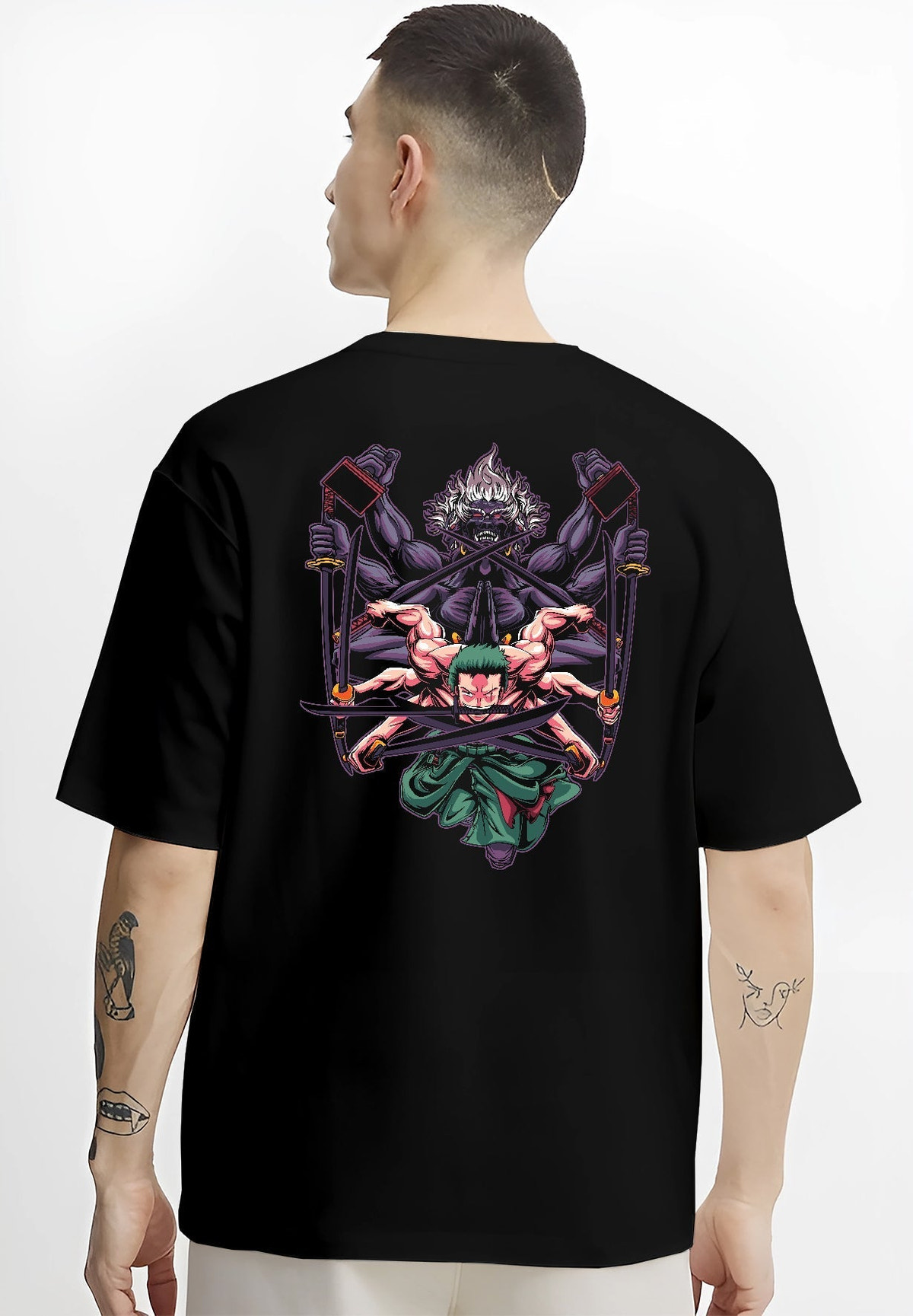 Black T-shirt worn by a male model, back view, featuring Zoro One Piece dark manga panel artwork with fierce three-sword pose and shonen battle anime detail.